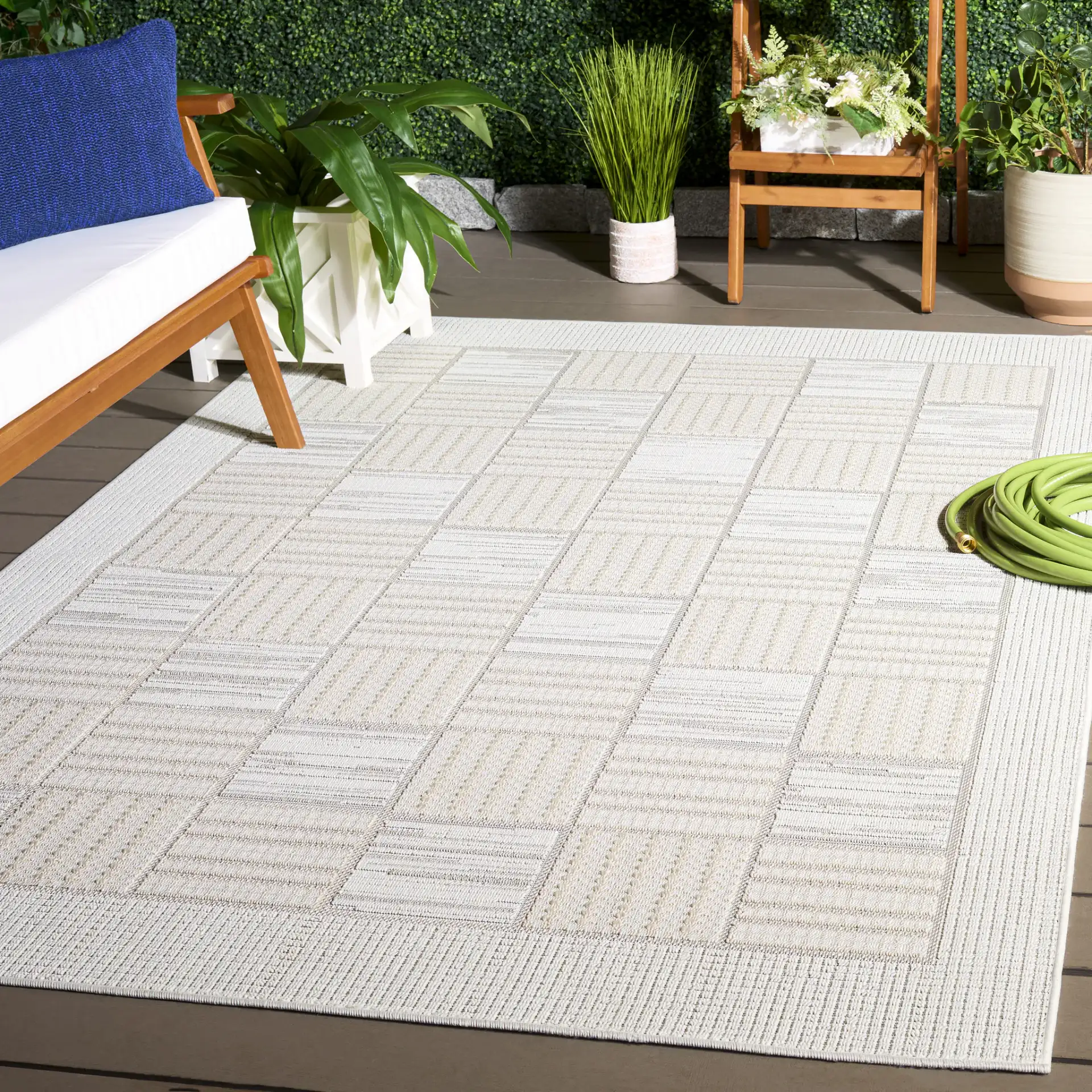 Veranda Checkered Grid Rug in Ivory / Beige in a styled room
