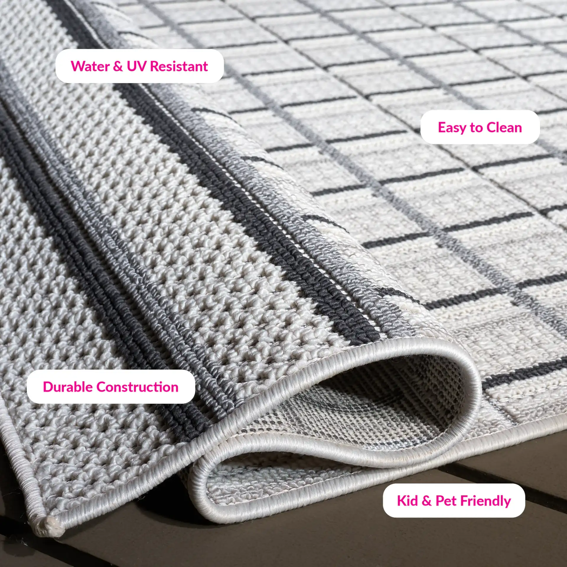 Veranda Grid Rug in Gray / Dark Gray in a styled room