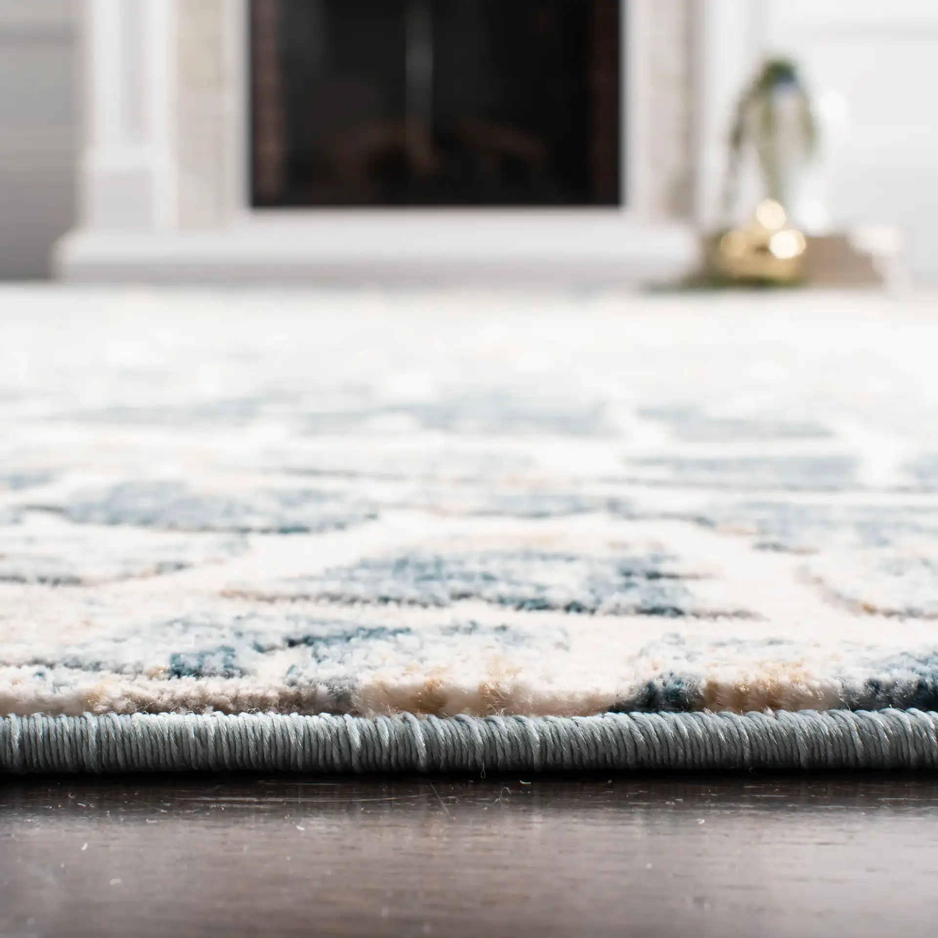 Vogue Concentric Ring Rug in Ivory / Teal in a styled room