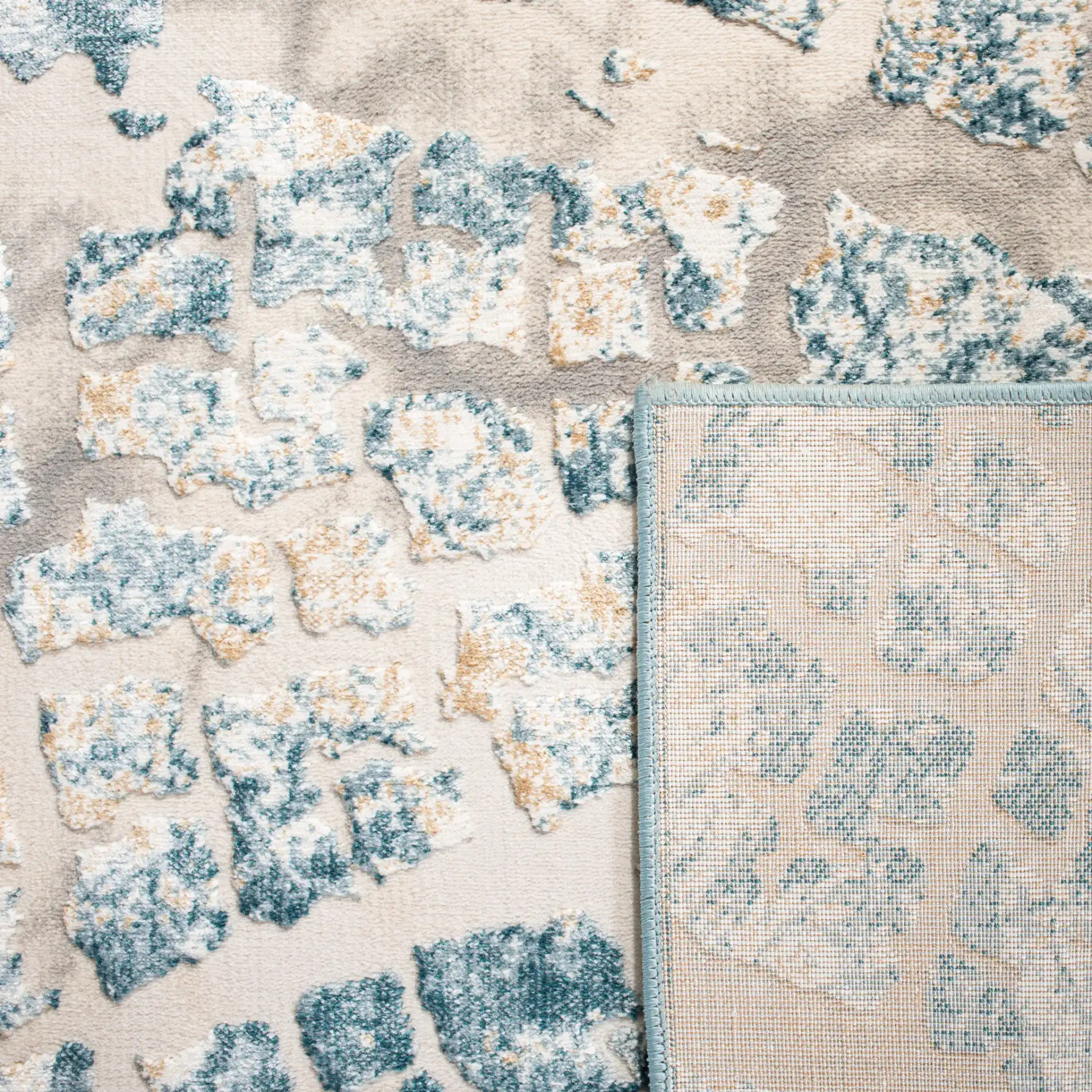 Vogue Concentric Ring Rug in Ivory / Teal in a styled room