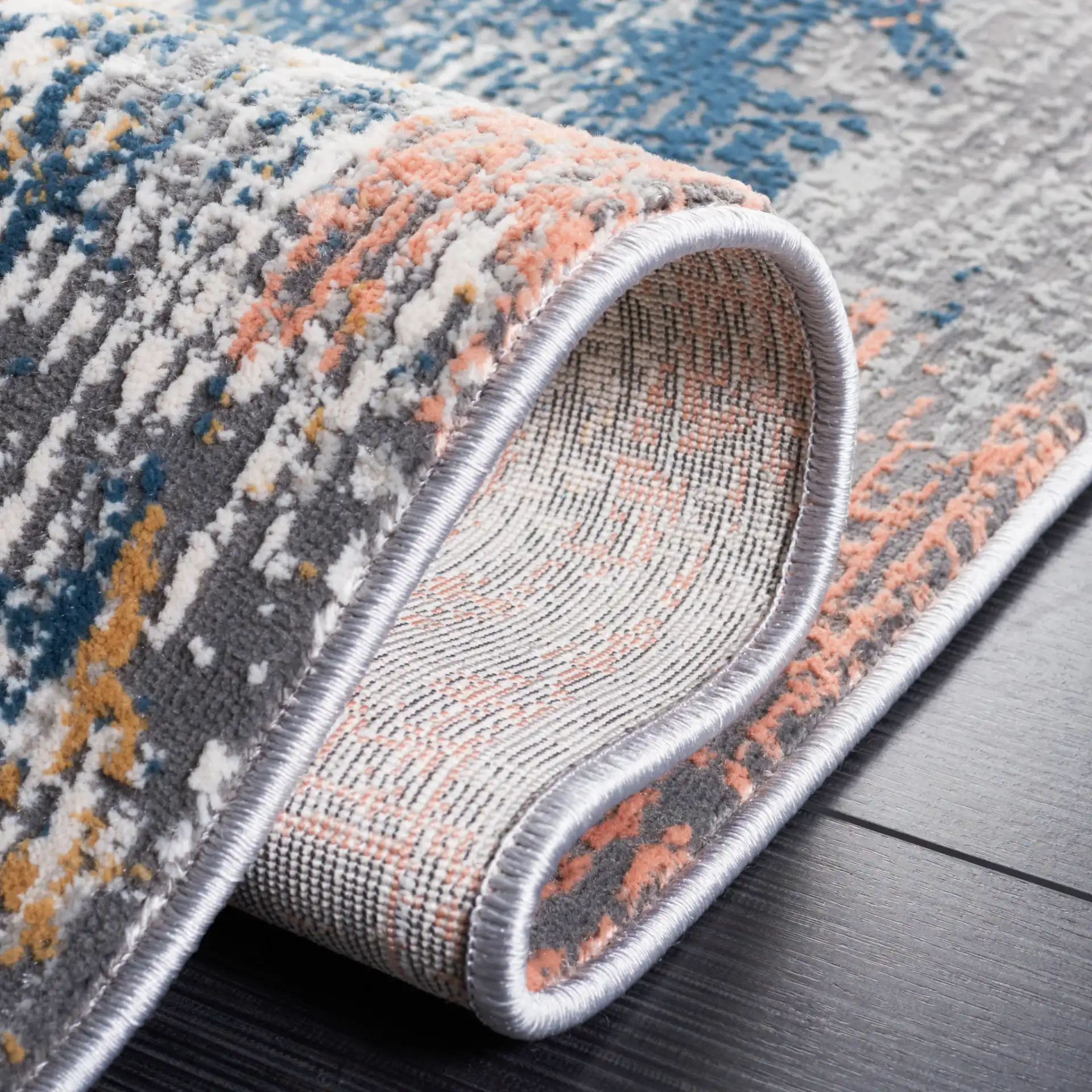 Vogue Abstract Wash Rug in Ivory / Blue Rust in a styled room