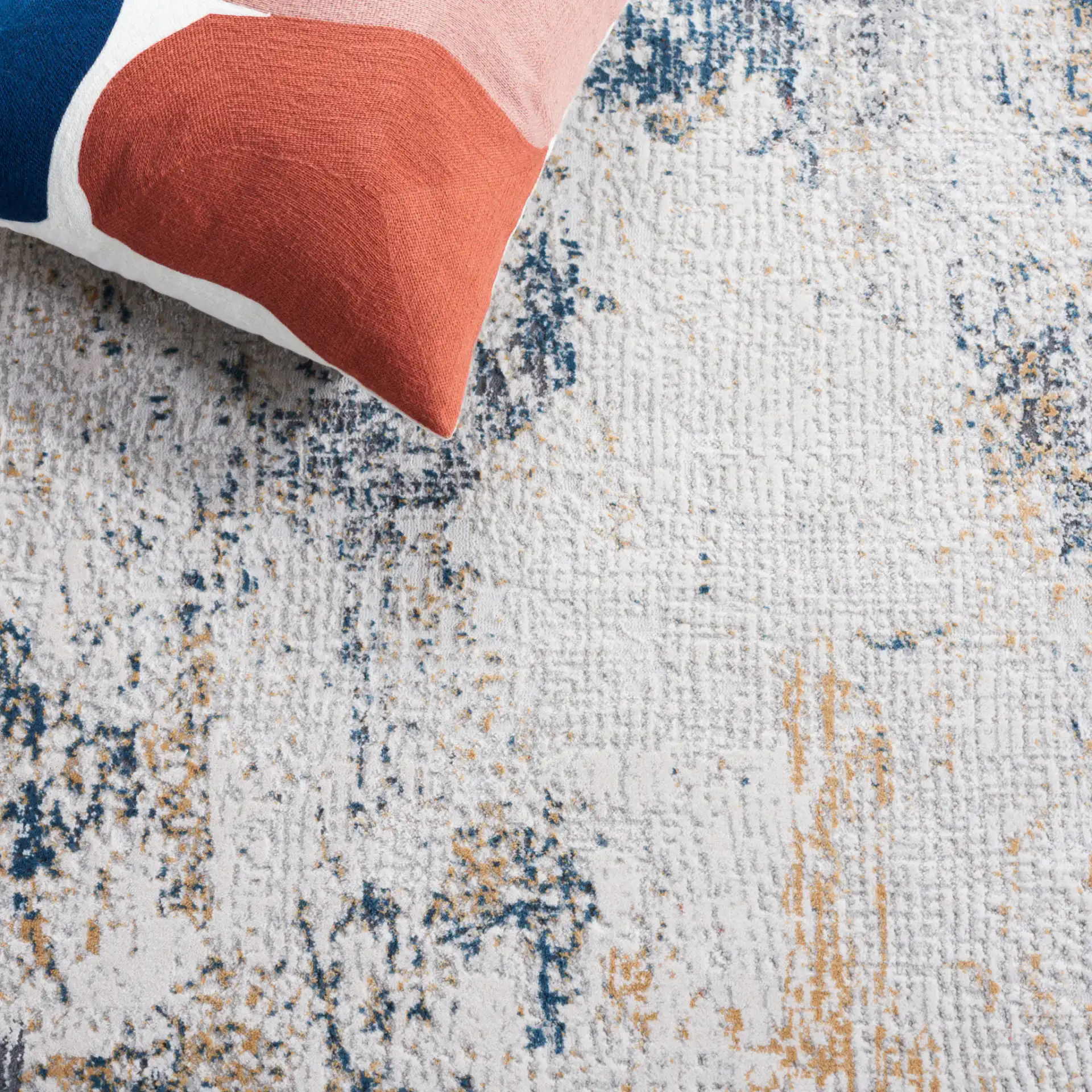 Vogue Abstract Wash Rug in Ivory / Blue Rust in a styled room