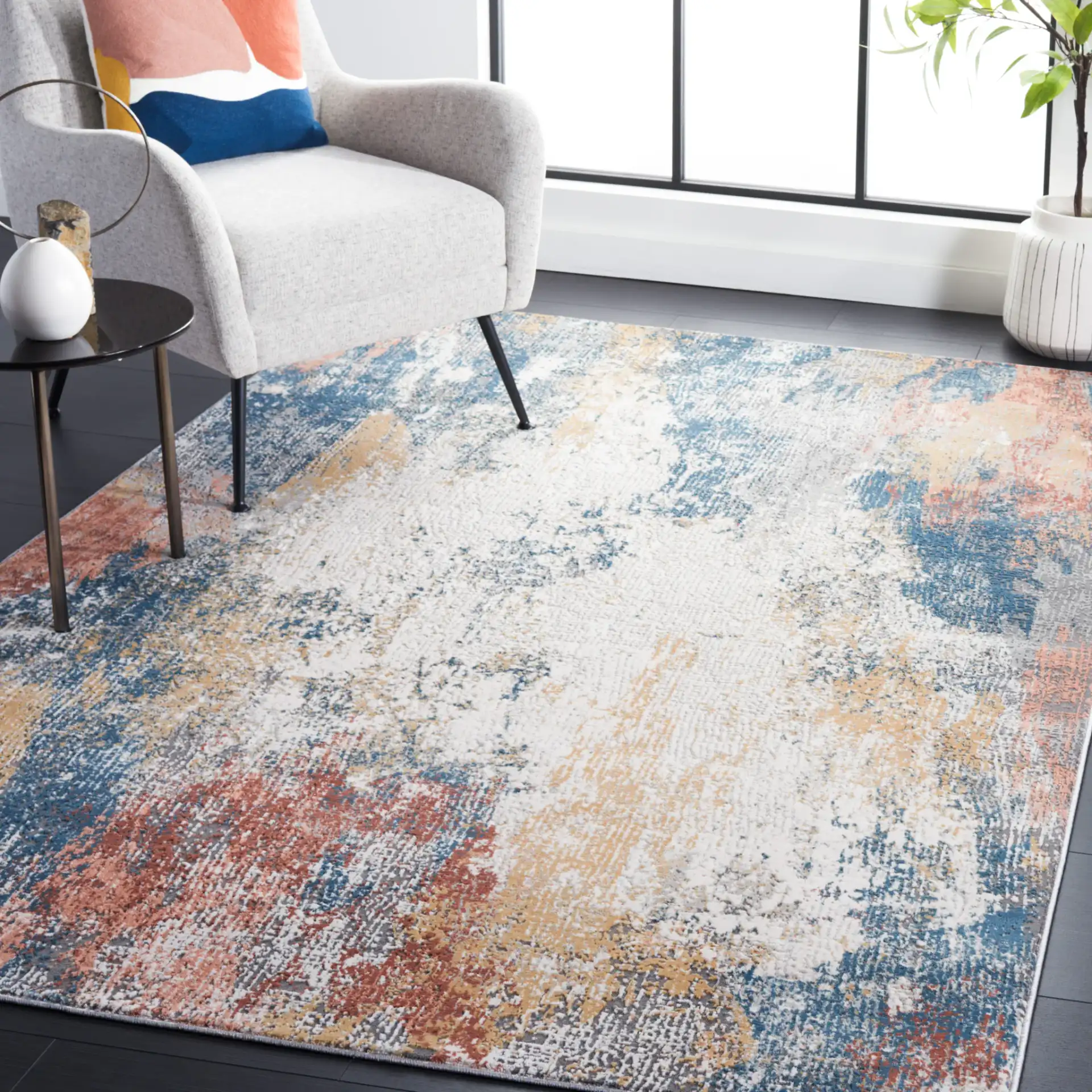 Vogue Abstract Wash Rug in Ivory / Blue Rust in a styled room