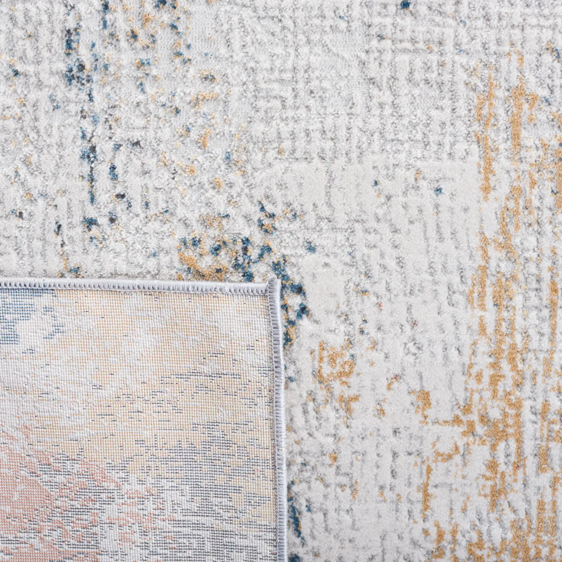 Vogue Abstract Wash Rug in Ivory / Blue Rust in a styled room