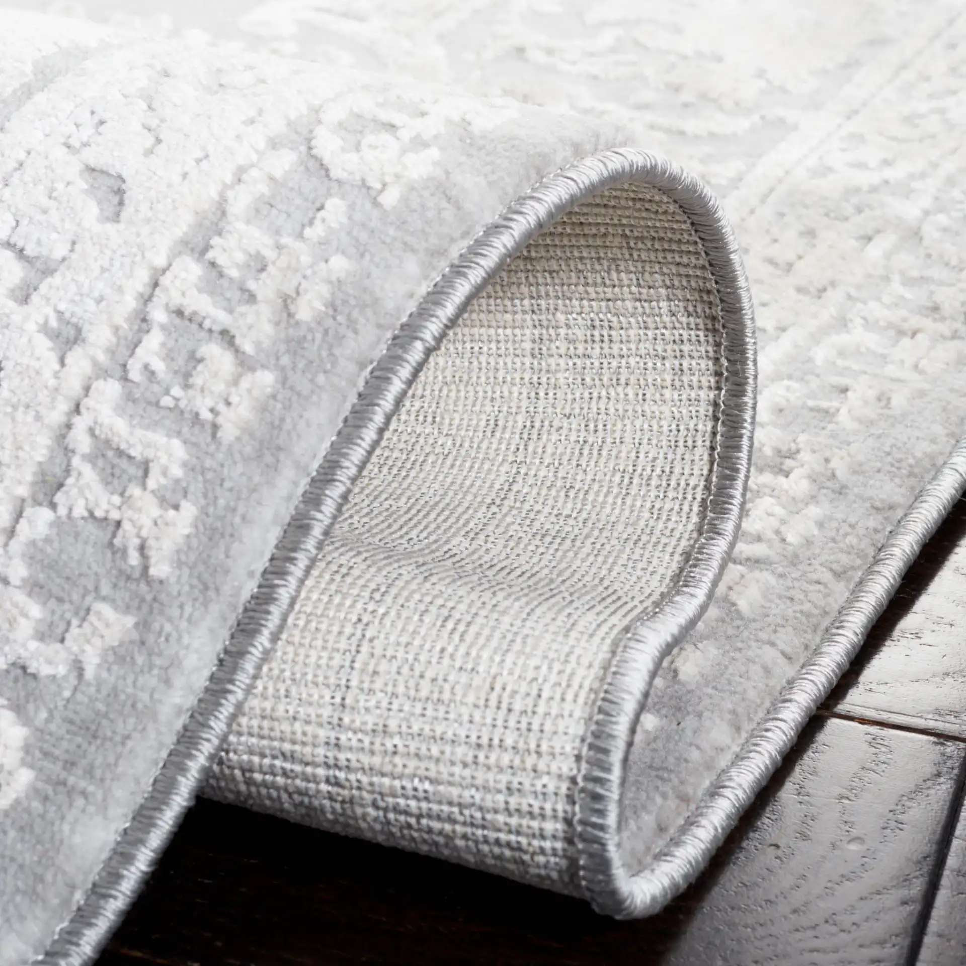 Vogue Floral Medallion Rug in Gray / Light Gray in a styled room