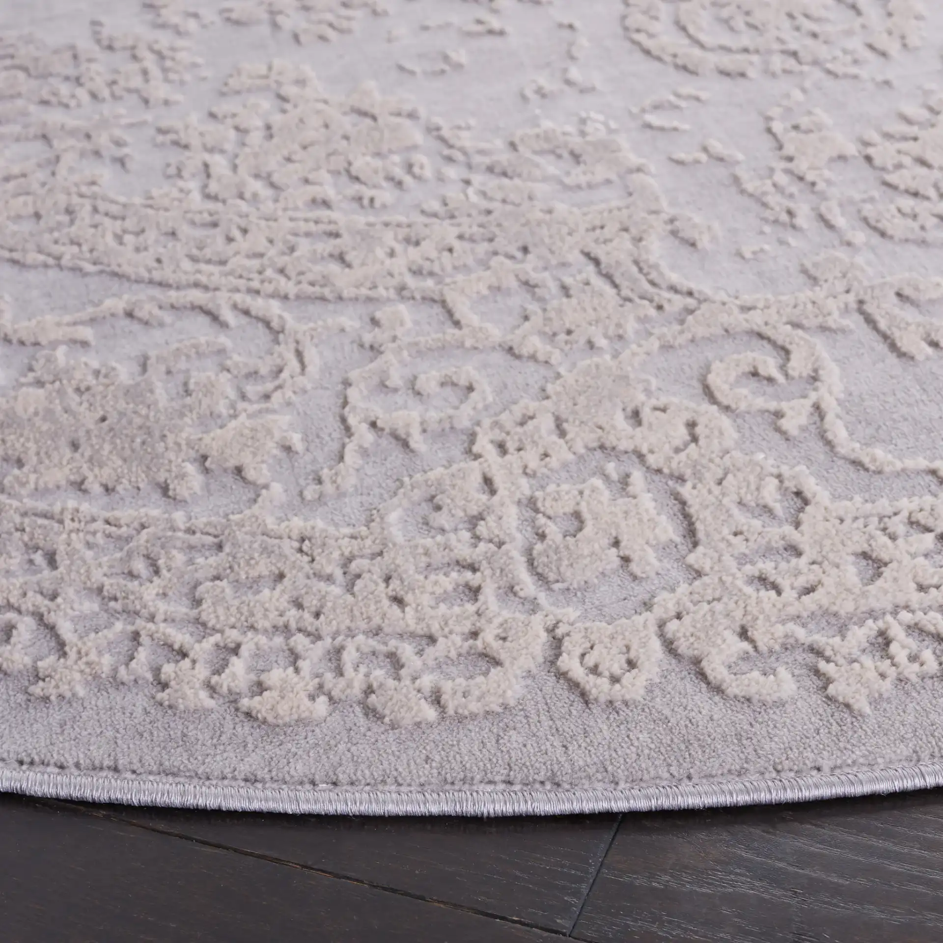 Vogue Floral Medallion Rug in Gray / Light Gray in a styled room
