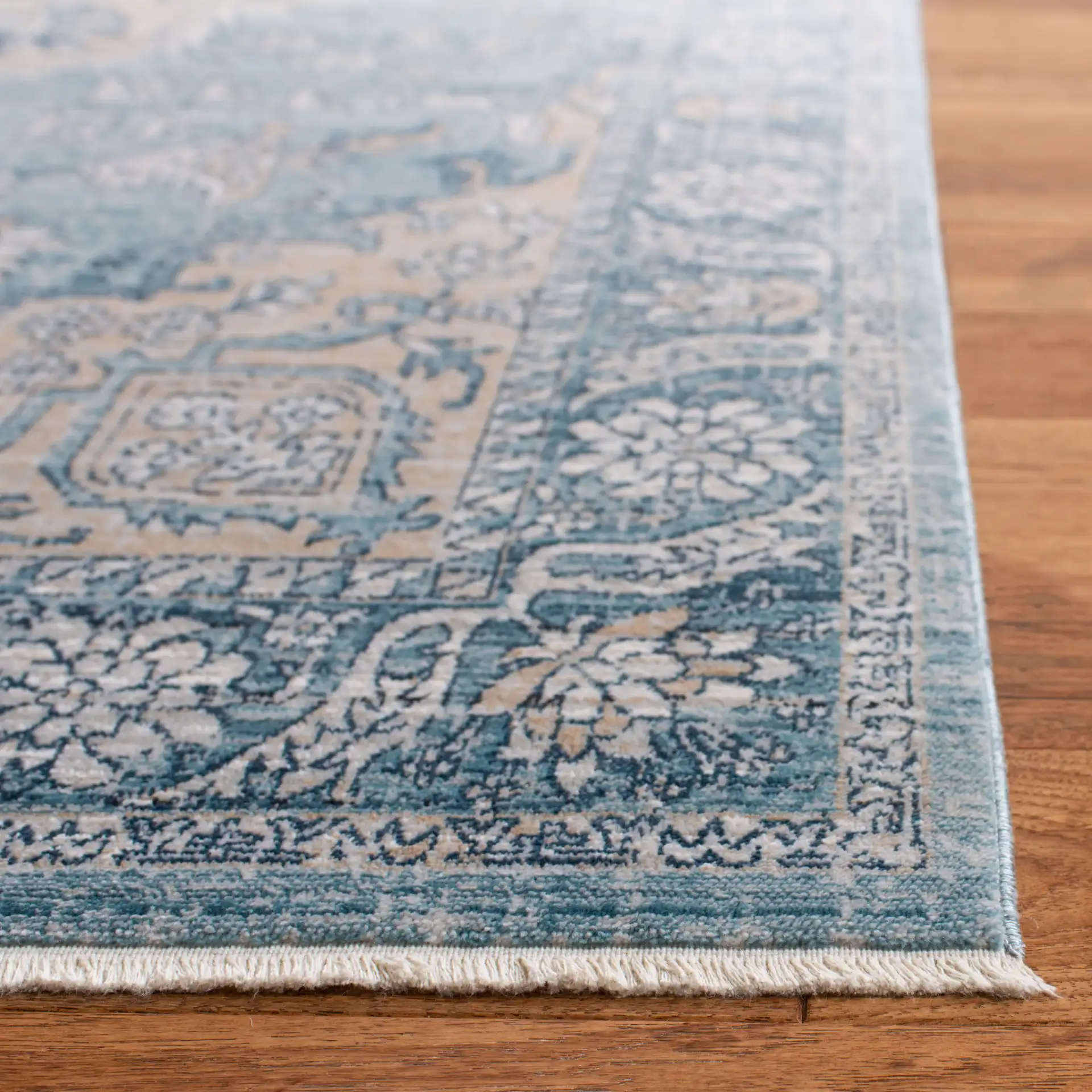 Victoria Floral Medallion Rug in Blue / Gray in a styled room