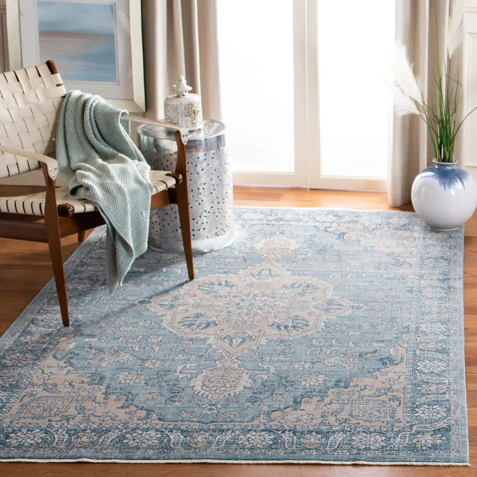 Victoria Floral Medallion Rug in Blue / Gray in a styled room