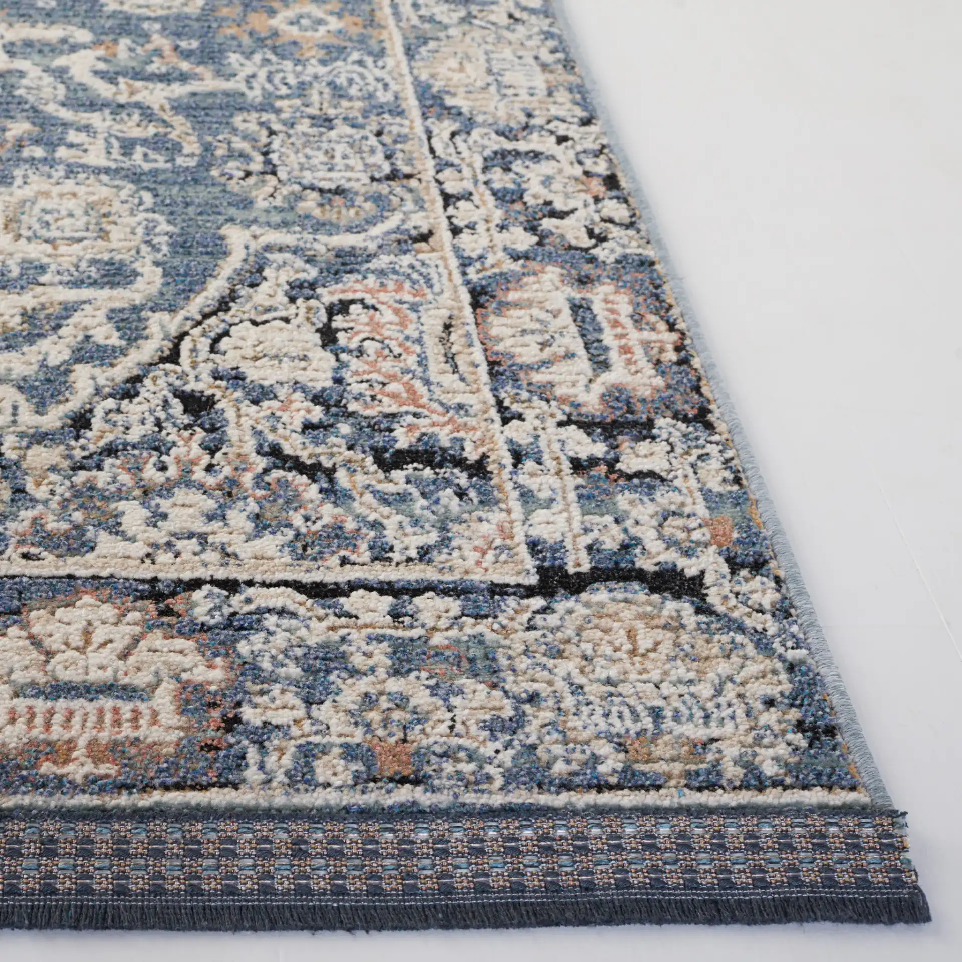 Vivaldi Floral Vine Rug in Navy / Ivory in a styled room