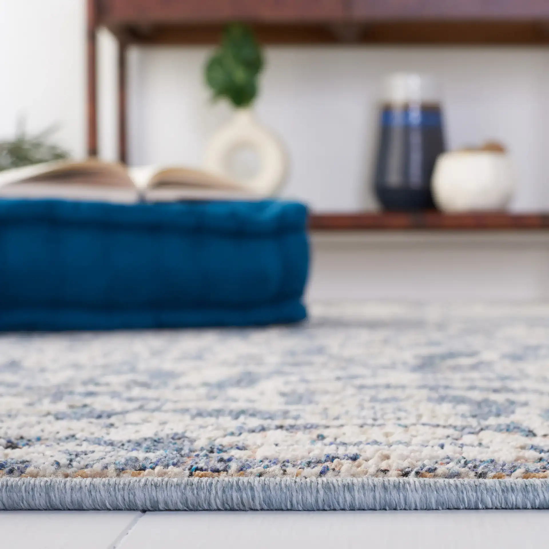 Vivaldi Floral Vine Rug in Navy / Ivory in a styled room