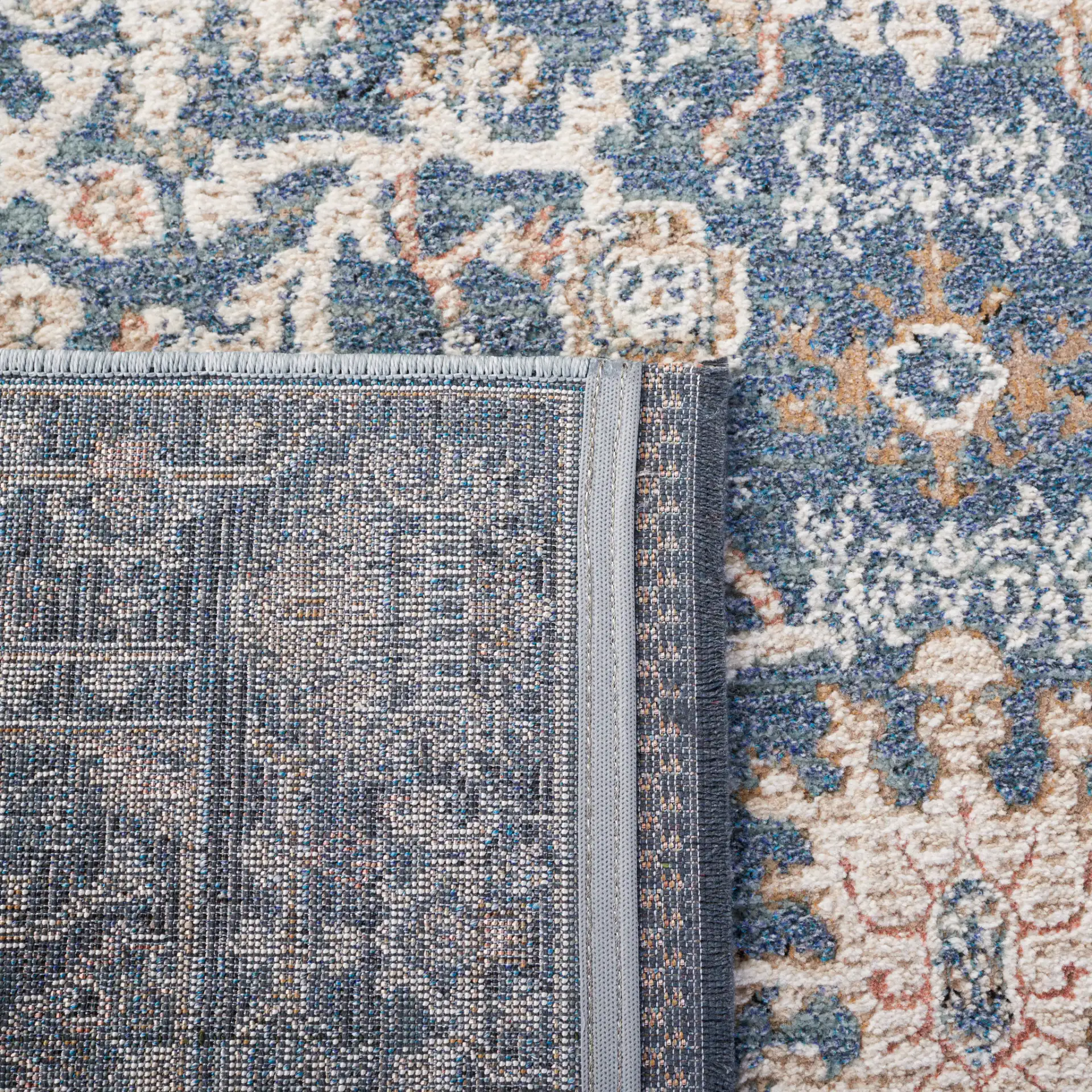 Vivaldi Floral Vine Rug in Navy / Ivory in a styled room