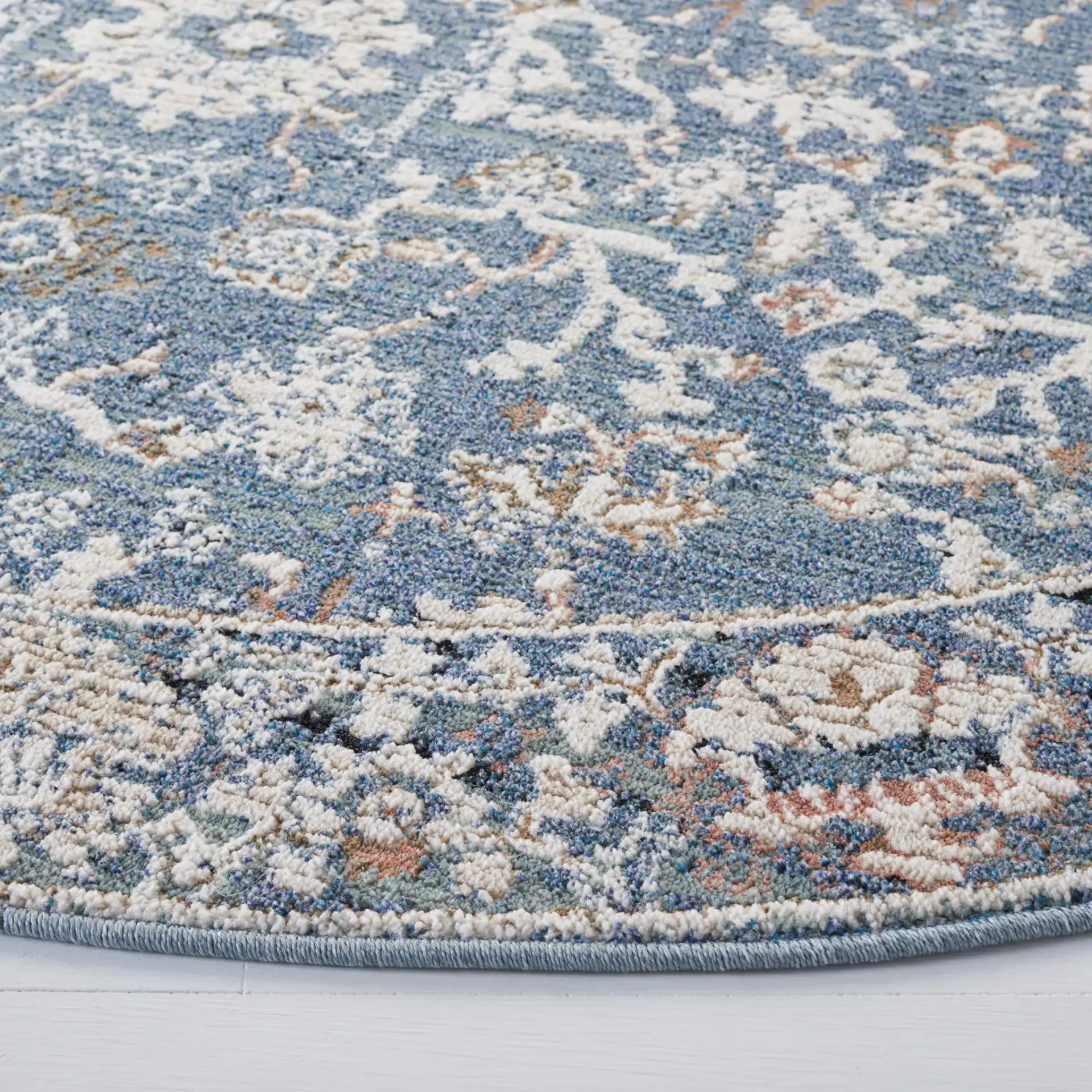 Vivaldi Floral Vine Rug in Navy / Ivory in a styled room