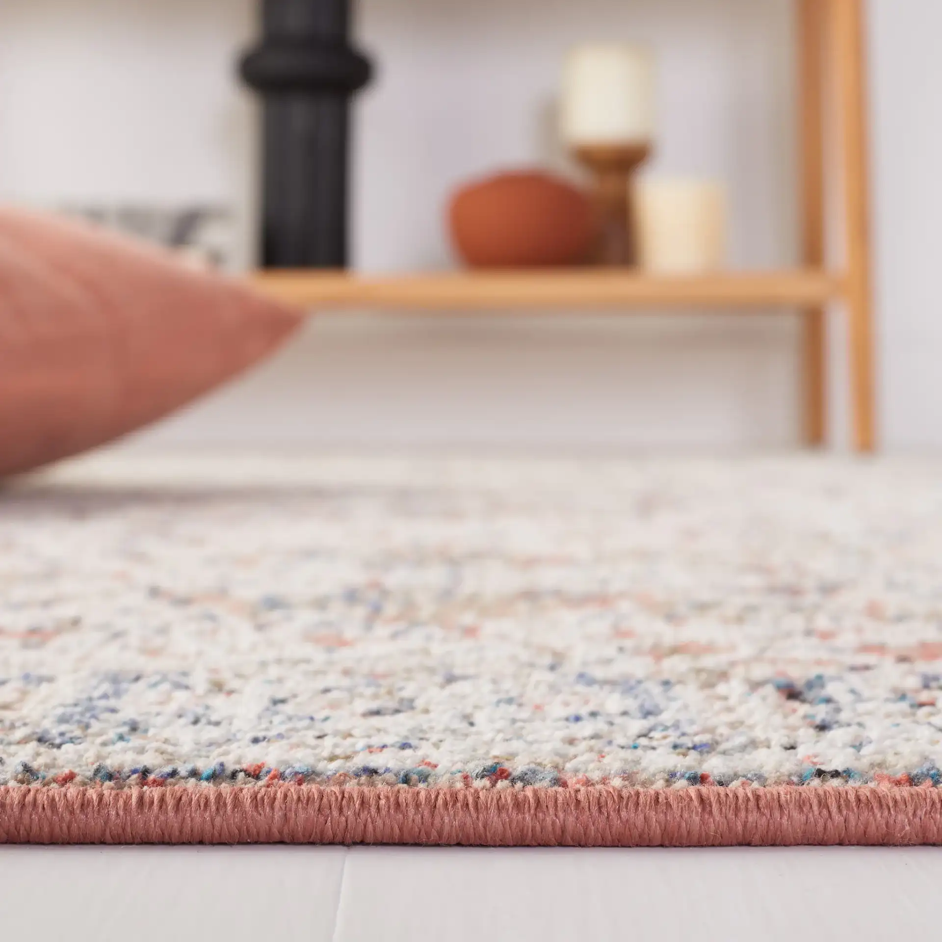 Vivaldi Bordered Traditional Rug in Navy / Rust in a styled room
