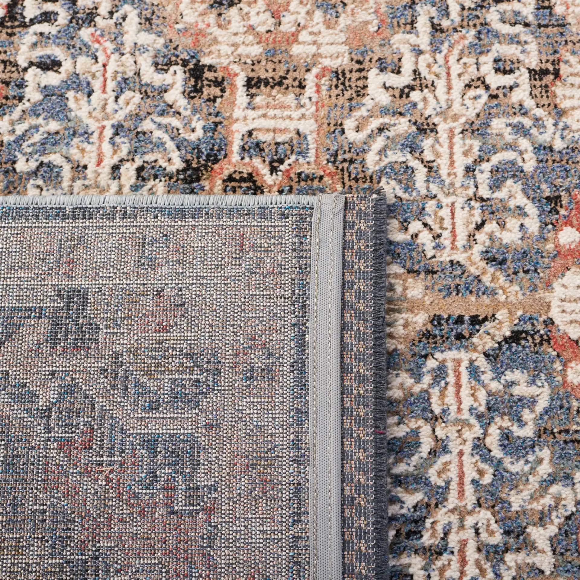 Vivaldi Distressed Floral Rug in Blue / Ivory in a styled room