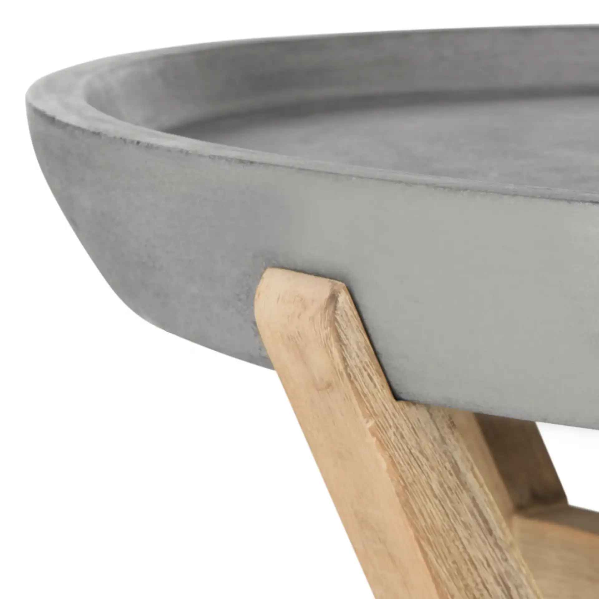 Wynn Indoor/Outdoor Coffee Table in Dark Gray in a styled room