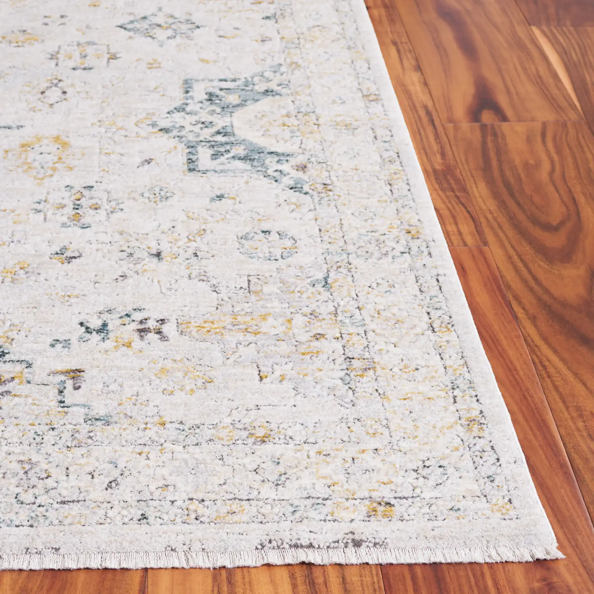 Verona Classic Medallion Rug in Ivory / Gold in a styled room