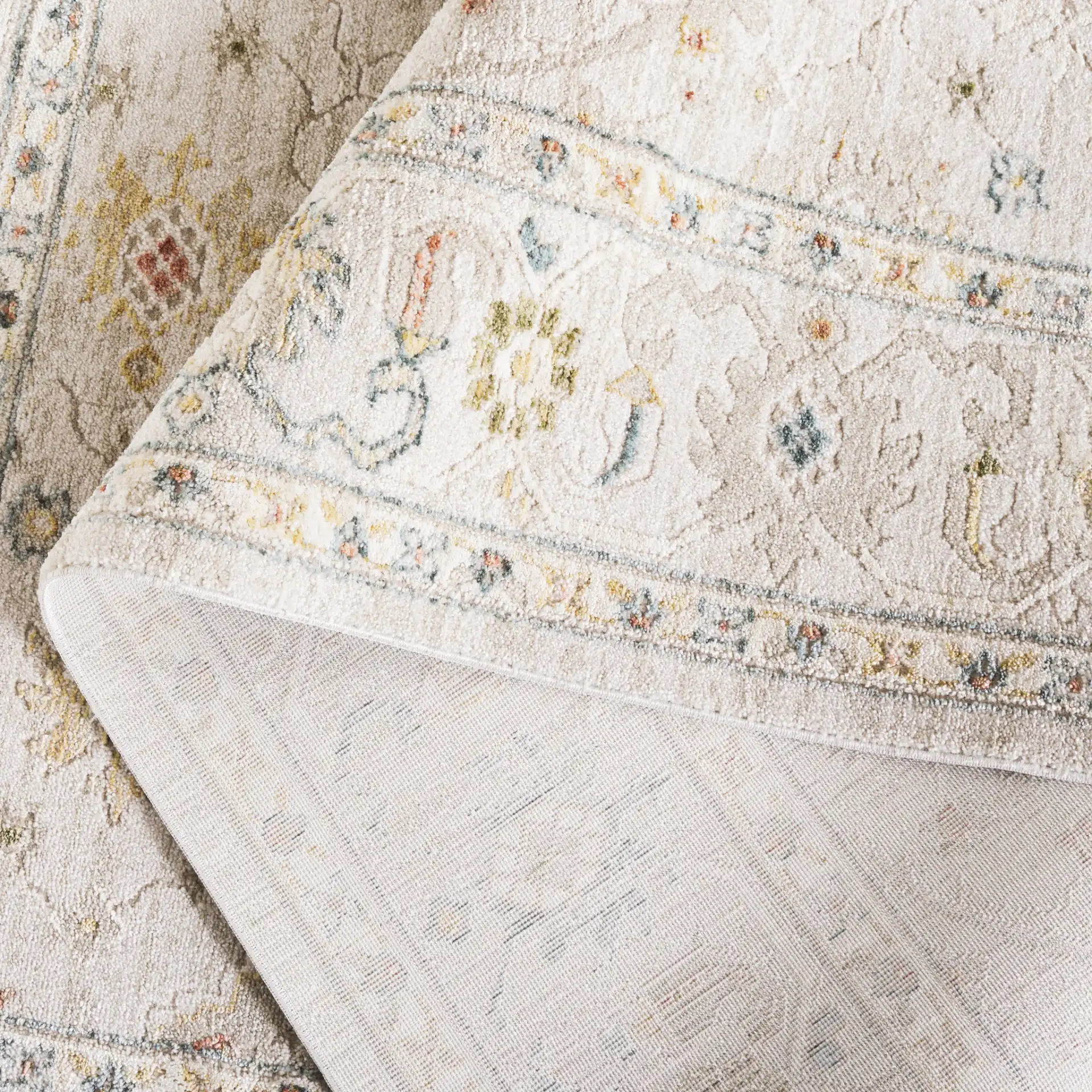 Verona Classic Medallion Border Rug in Ivory in a styled room