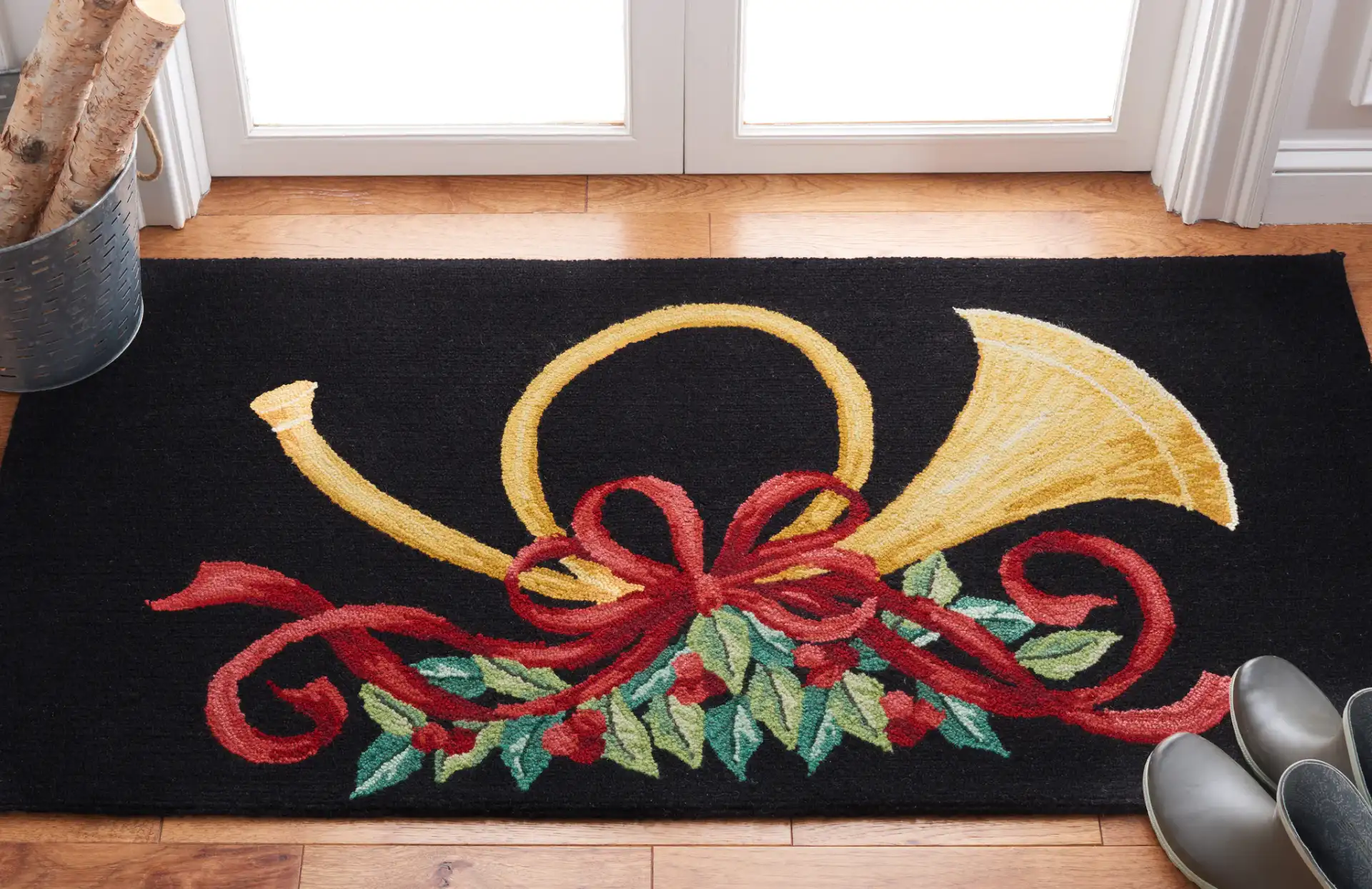 Vintage Posters Holiday Horn Hand-Hooked Wool Rug in Black / Multicolor in a styled room