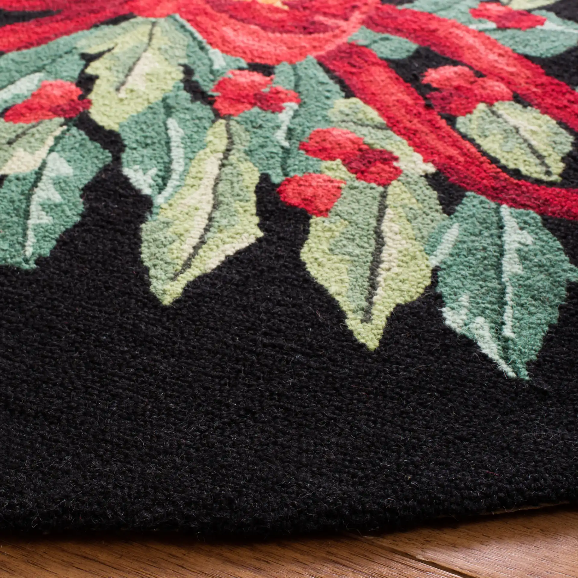 Vintage Posters Holiday Horn Hand-Hooked Wool Rug in Black / Multicolor in a styled room