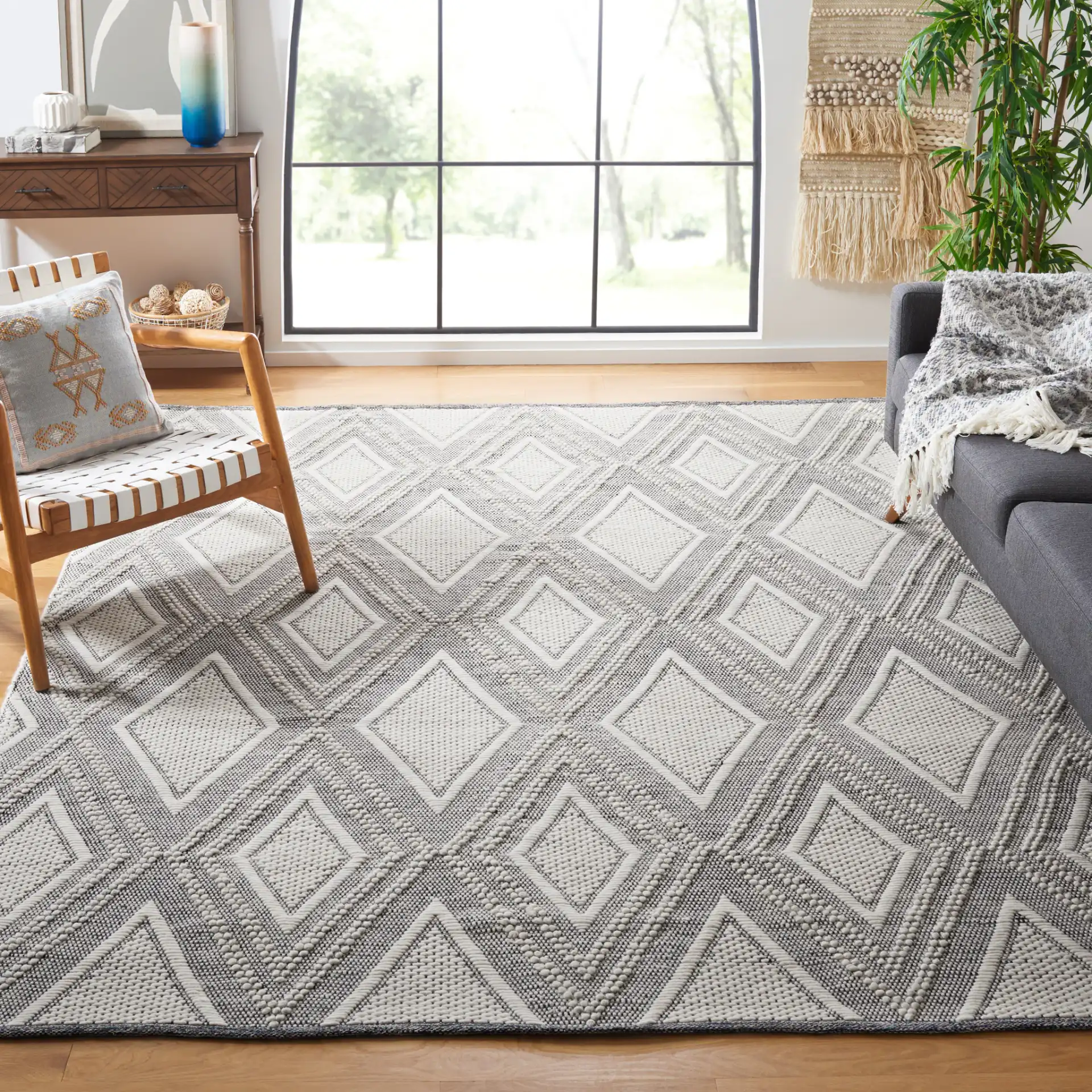 Vermont Nested Diamond Hand-Woven Wool Rug in Ivory / Navy in a styled room