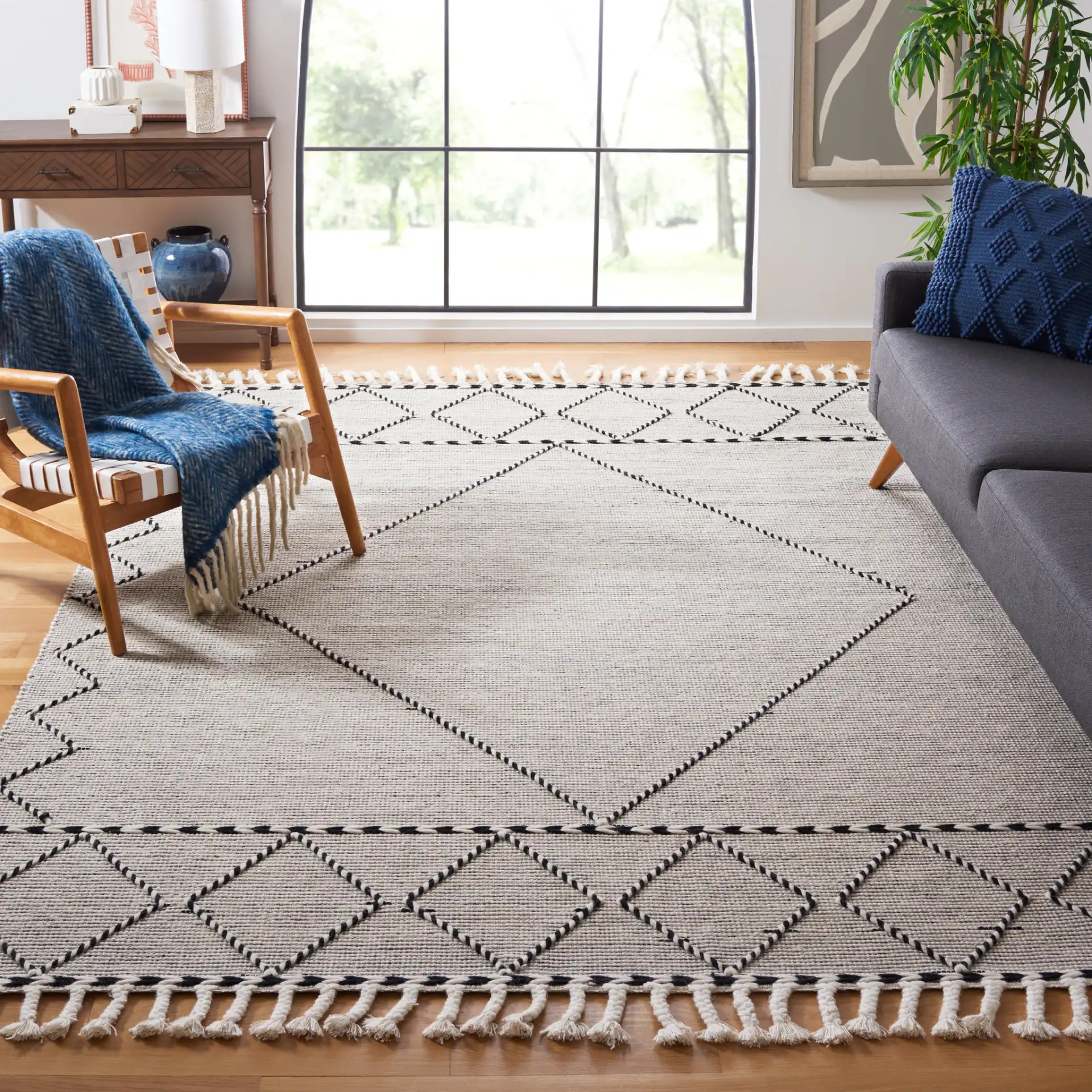 Vermont Large Diamond Hand-Woven Wool Rug in Ivory / Black in a styled room