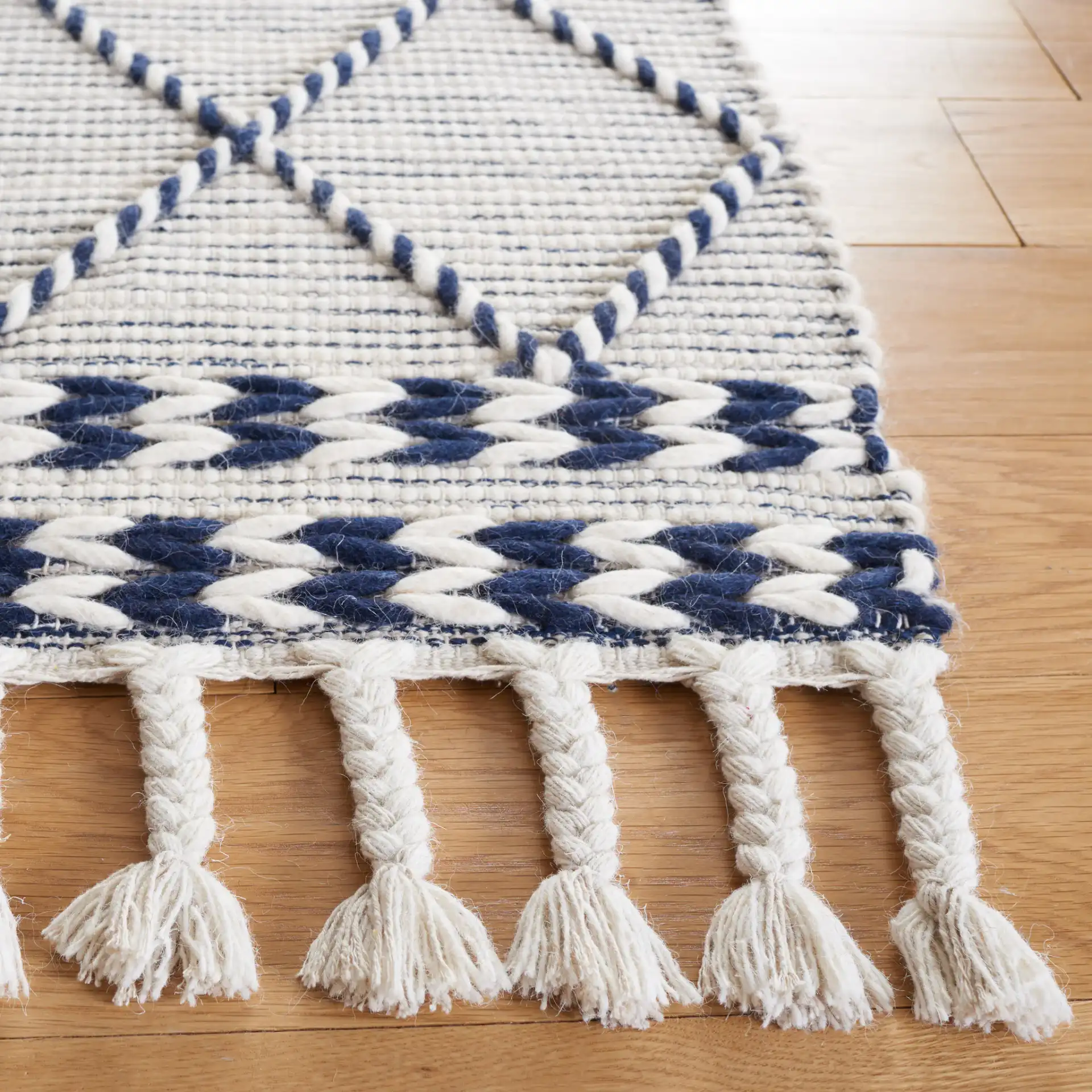 Vermont Moroccan Diamond Hand-Woven Wool Rug in Ivory / Navy in a styled room