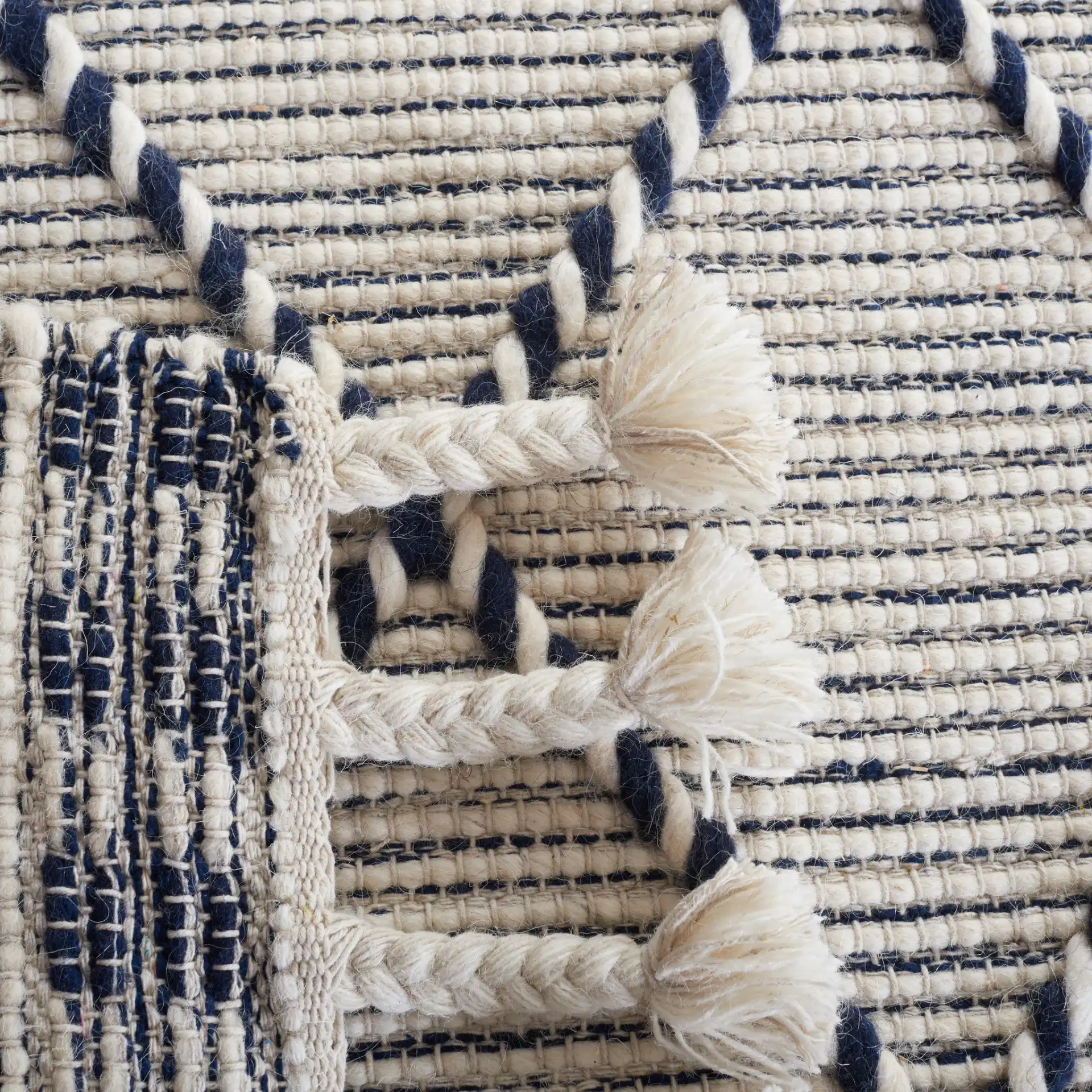 Vermont Moroccan Diamond Hand-Woven Wool Rug in Ivory / Navy in a styled room