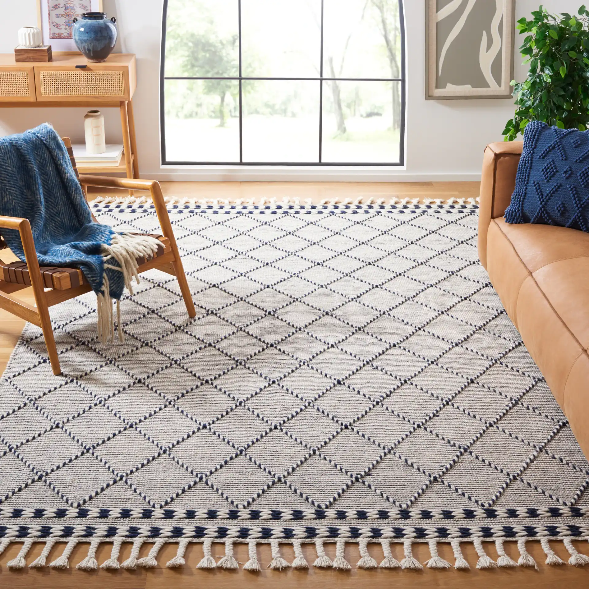 Vermont Moroccan Diamond Hand-Woven Wool Rug in Ivory / Navy in a styled room