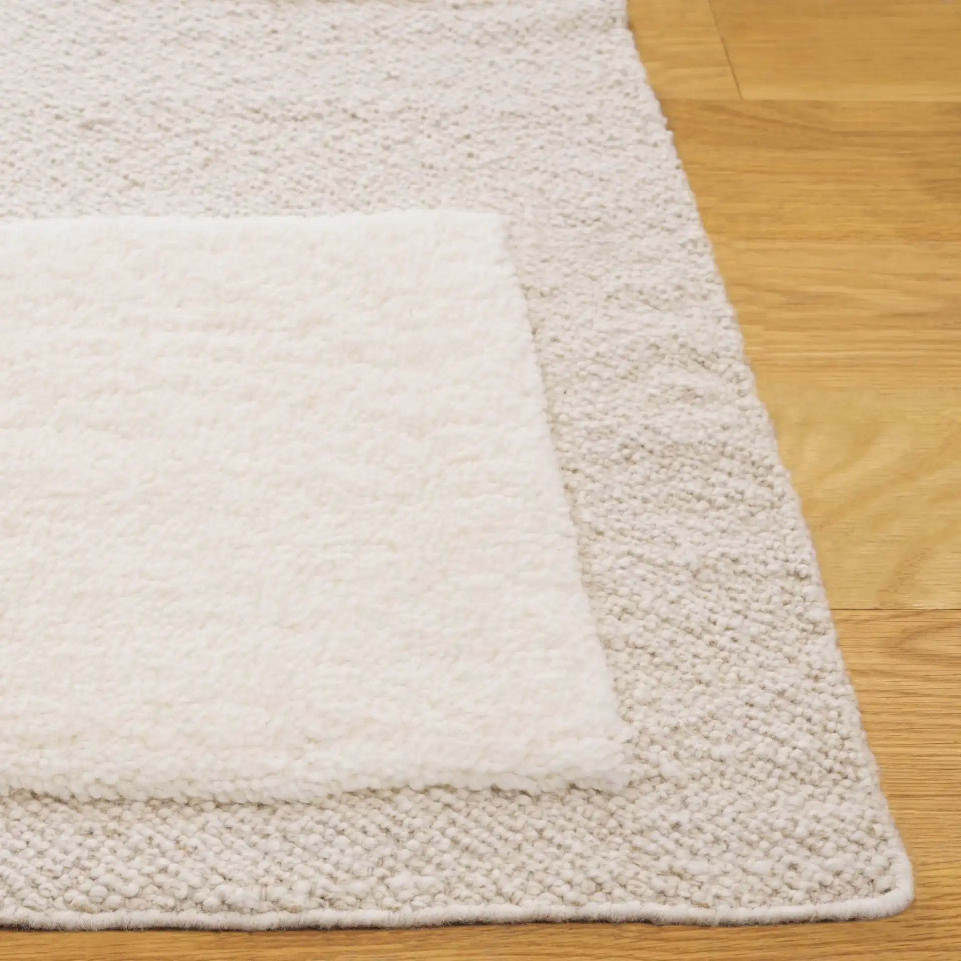 Vermont Textured Blocks Hand-Woven Wool Rug in Ivory in a styled room
