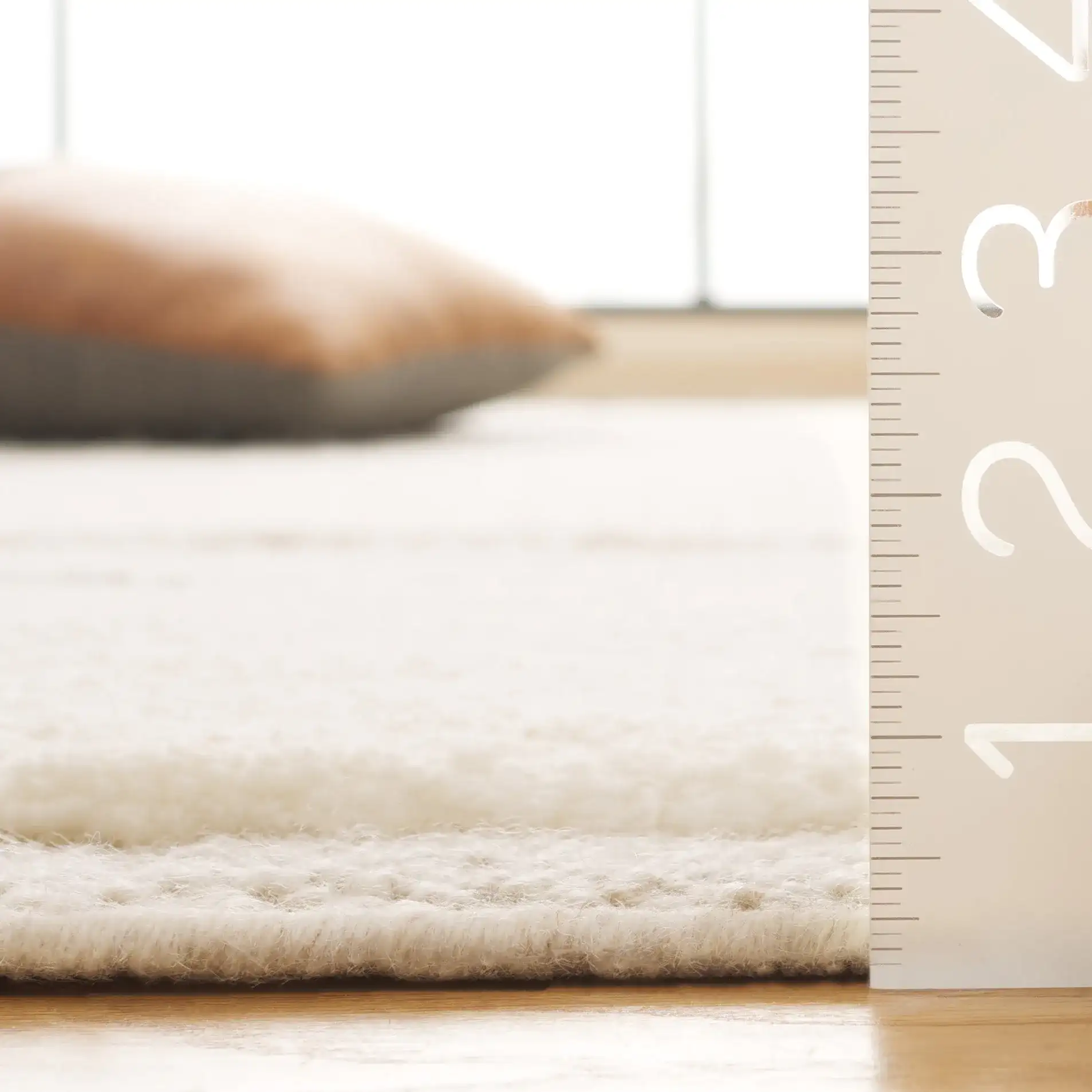 Vermont Textured Blocks Hand-Woven Wool Rug in Ivory in a styled room