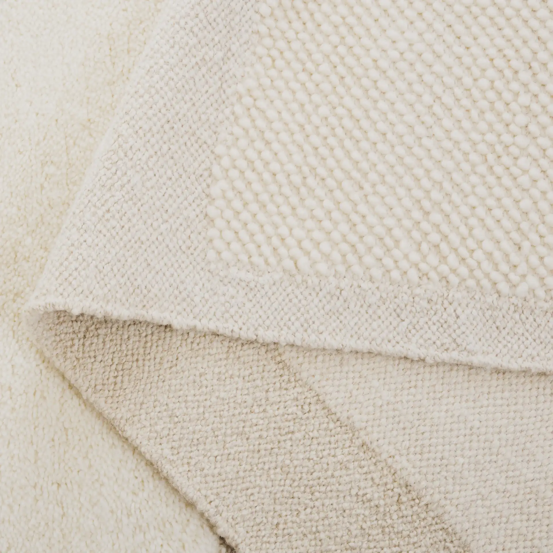 Vermont Textured Blocks Hand-Woven Wool Rug in Ivory in a styled room