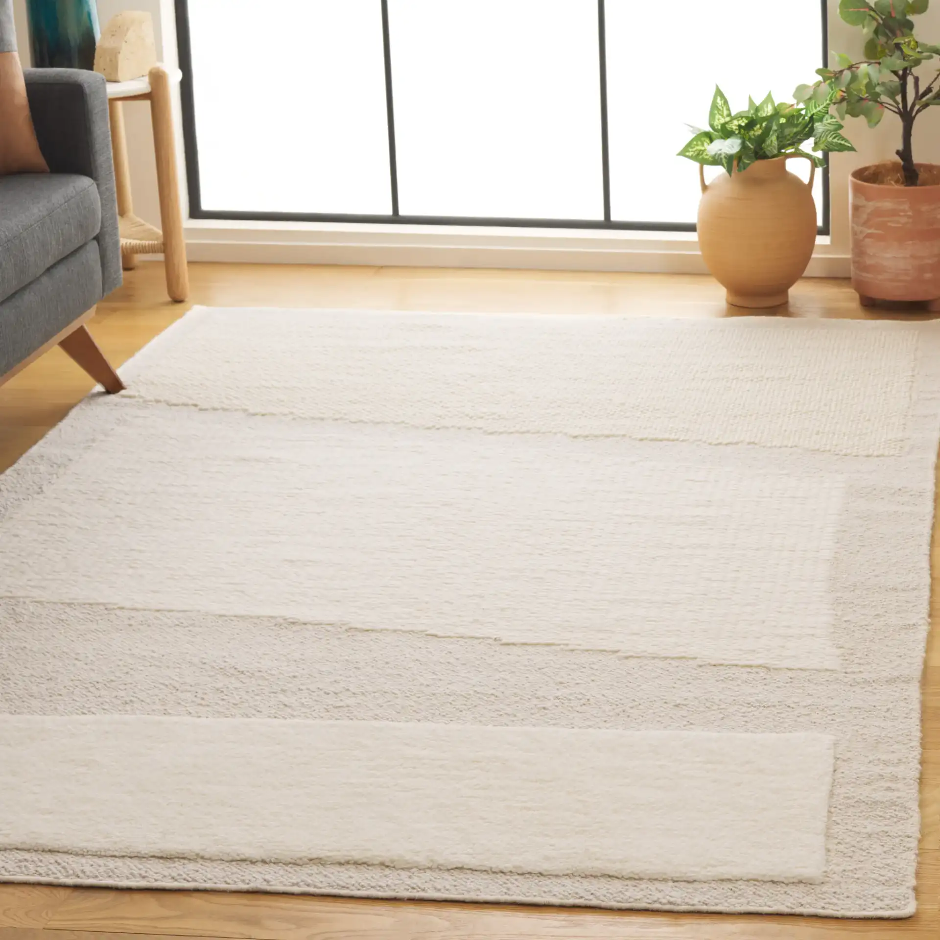 Vermont Textured Blocks Hand-Woven Wool Rug in Ivory in a styled room