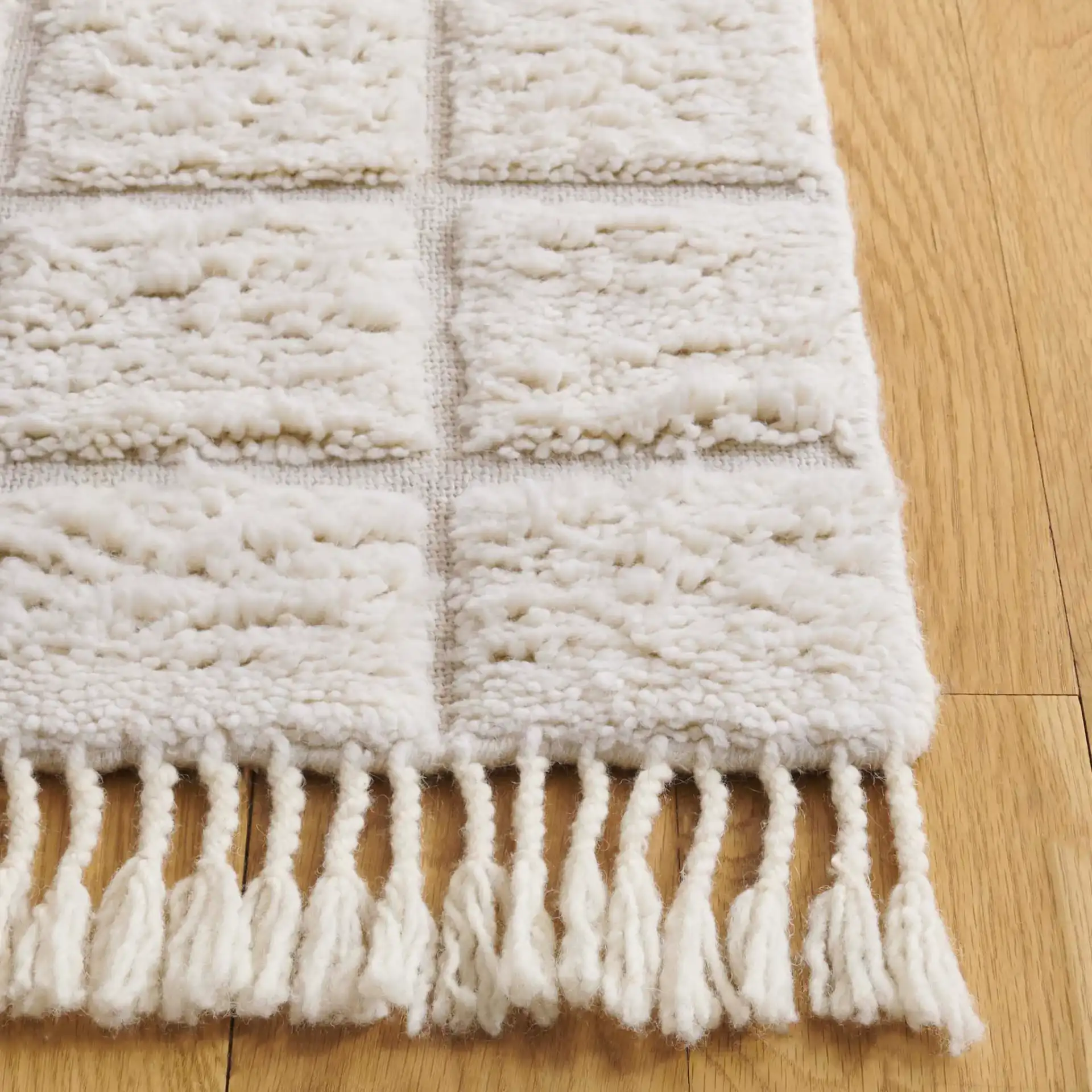 Vermont Grid Wool Rug in Ivory in a styled room