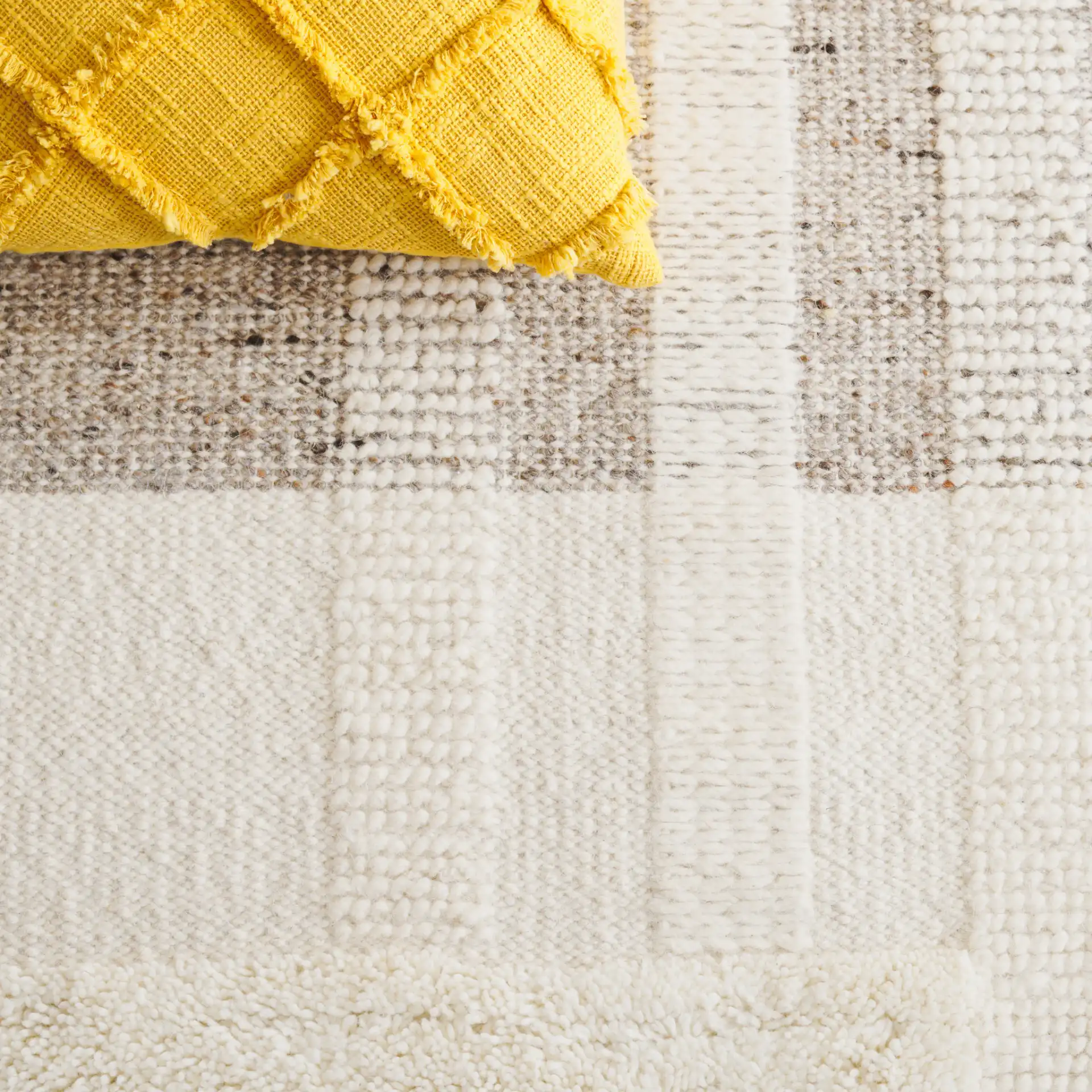 Vermont Color-Block Hand-Woven Wool Rug in Ivory / Beige in a styled room