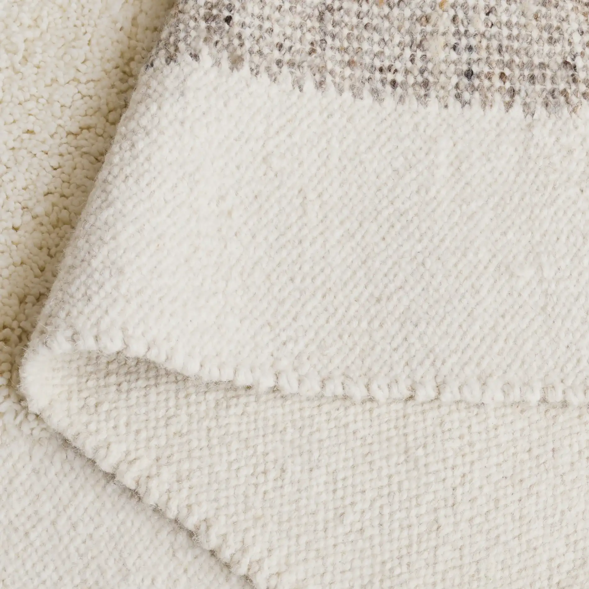 Vermont Color-Block Hand-Woven Wool Rug in Ivory / Beige in a styled room