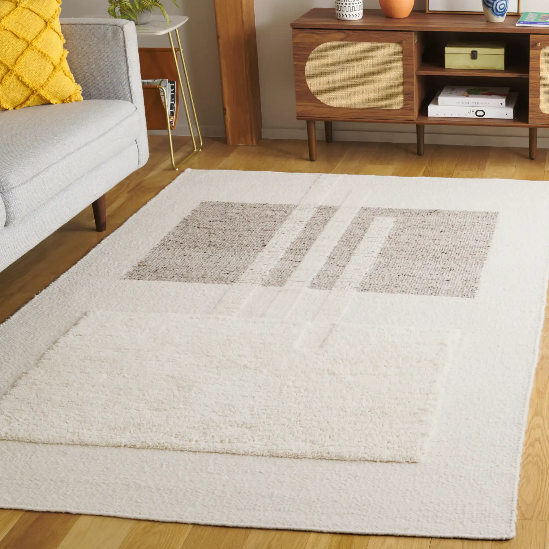 Vermont Color-Block Hand-Woven Wool Rug in Ivory / Beige in a styled room