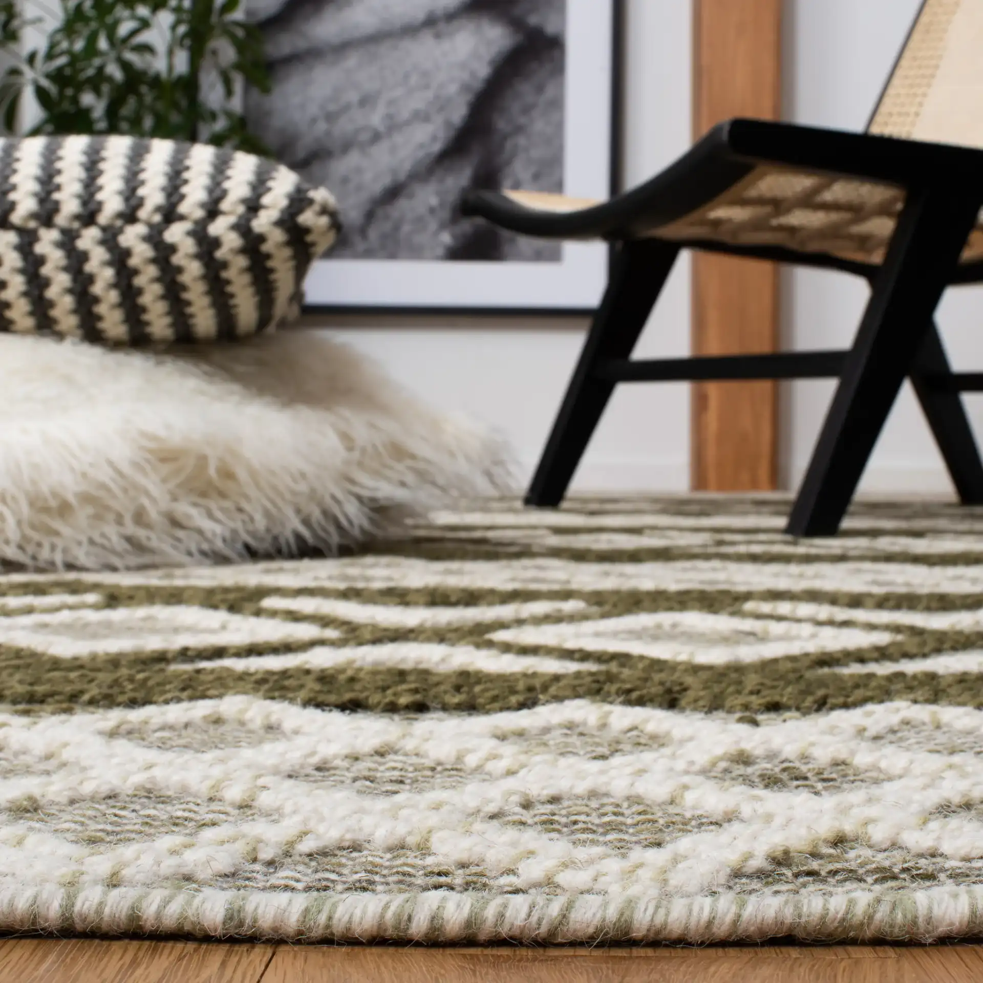 Vermont Banded Diamond Hand-Woven Wool and Cotton Rug in Ivory / Dark Green in a styled room