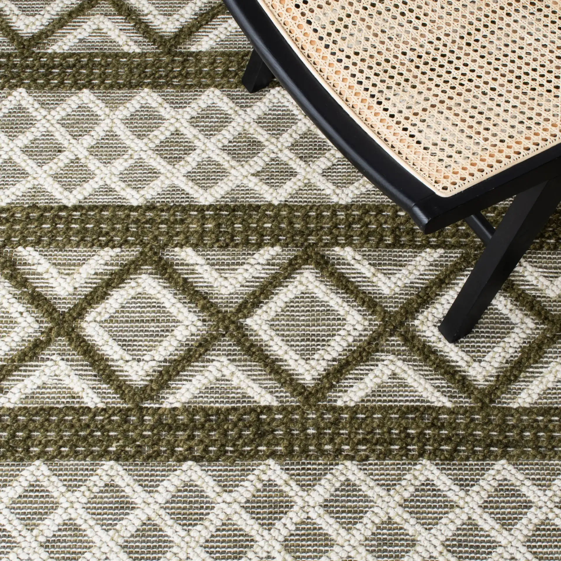Vermont Banded Diamond Hand-Woven Wool and Cotton Rug in Ivory / Dark Green in a styled room