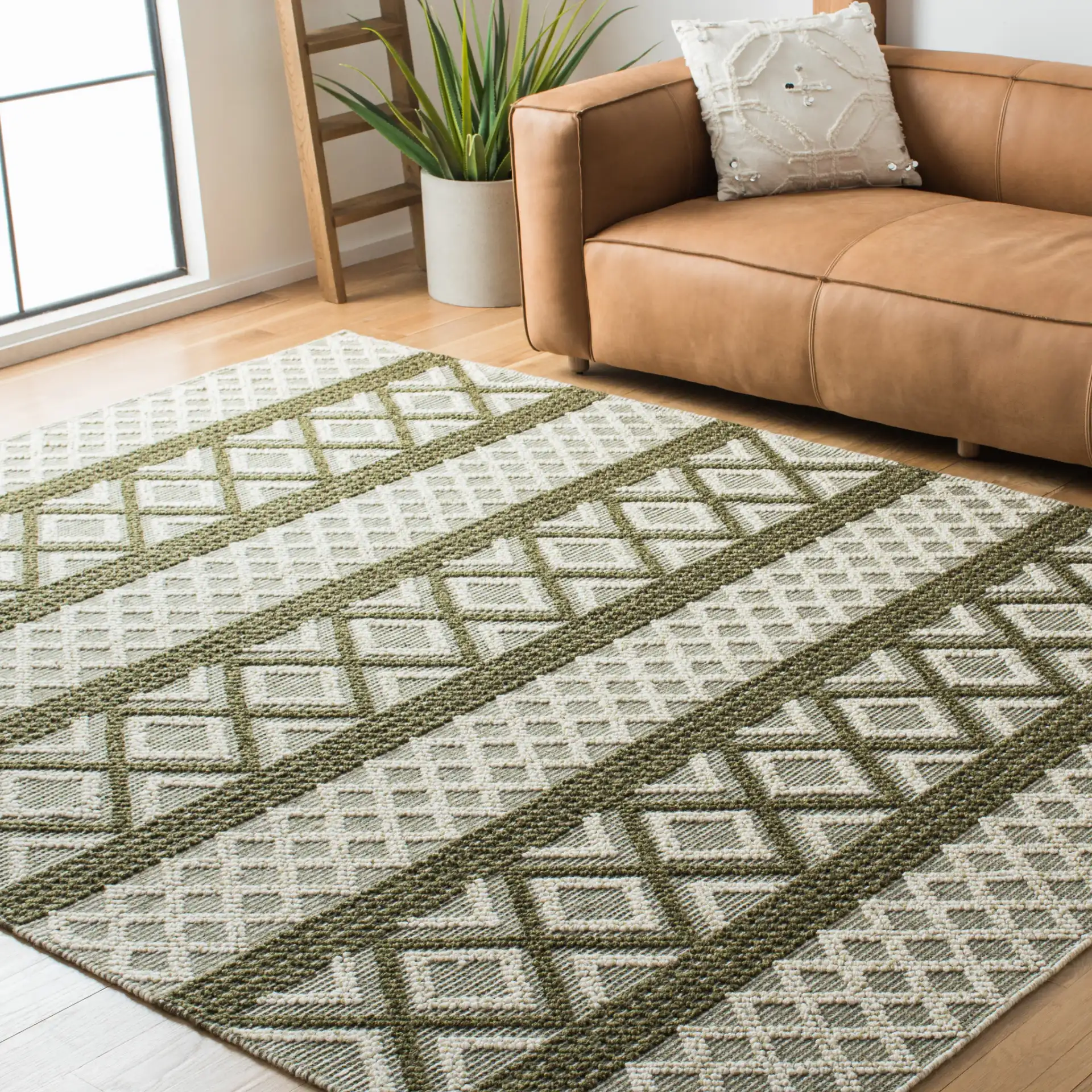Vermont Banded Diamond Hand-Woven Wool and Cotton Rug in Ivory / Dark Green in a styled room