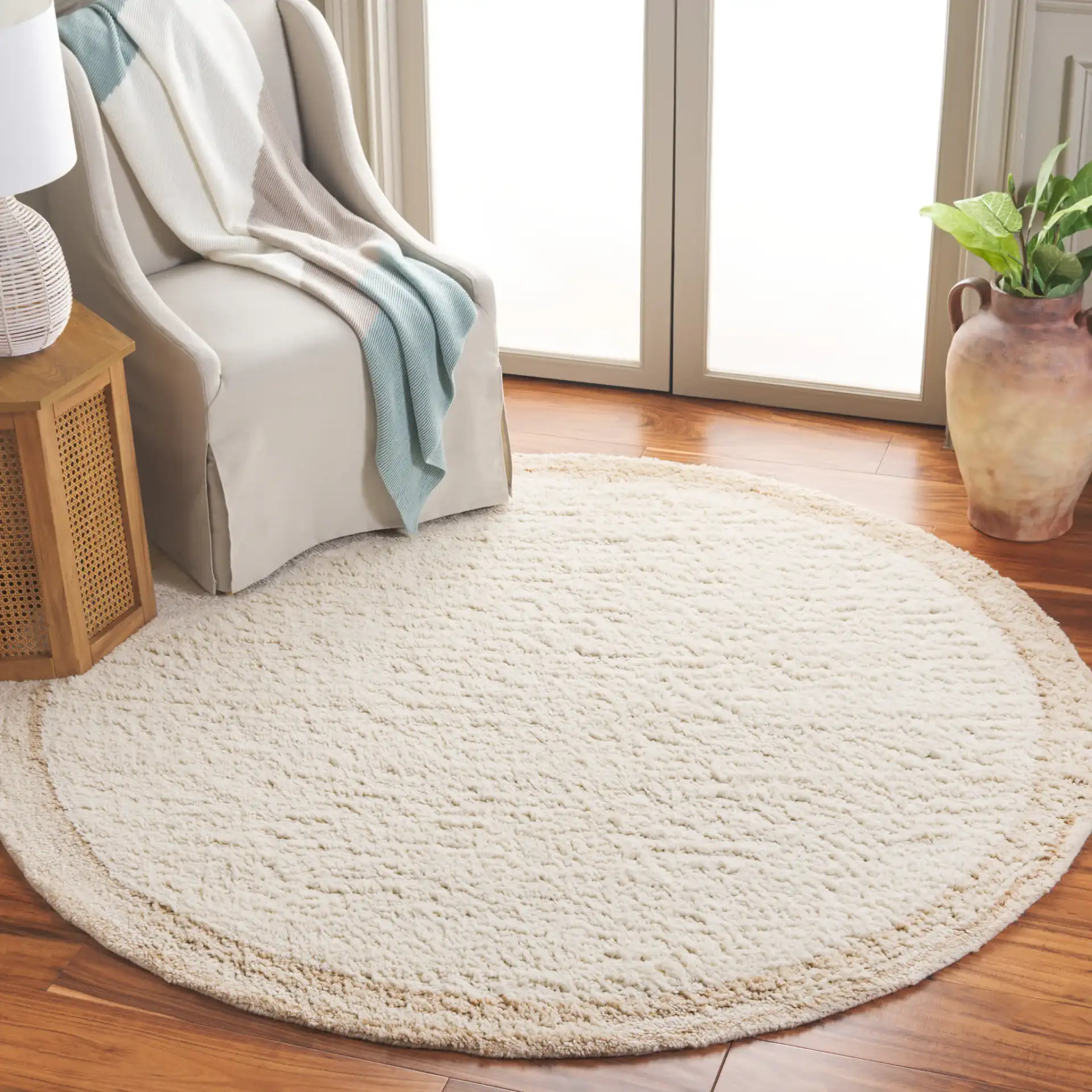 Vermont Border Shag Wool Rug in Ivory / Beige in a styled room