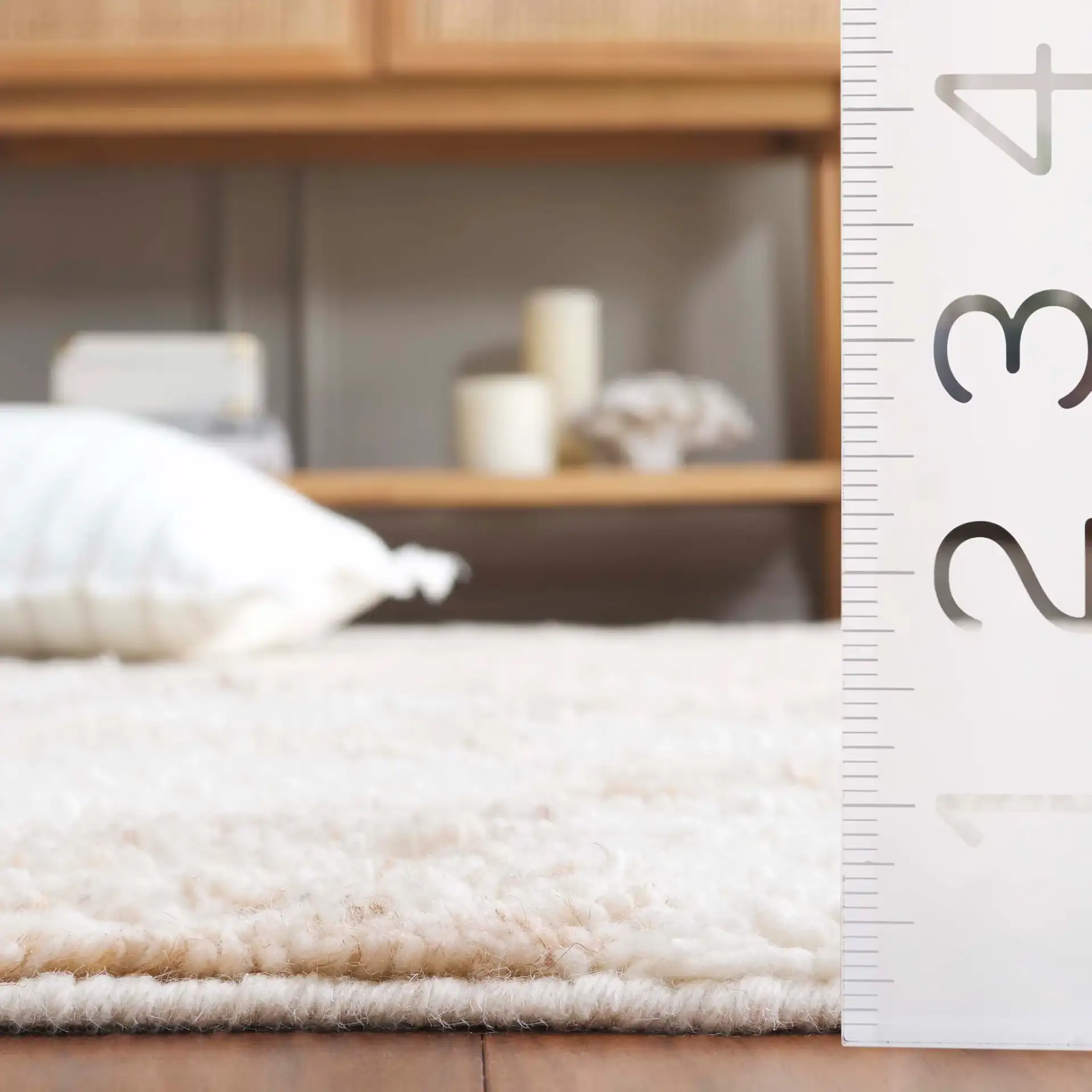 Vermont Checkerboard Hand-Tufted Wool Rug in Beige / Ivory in a styled room