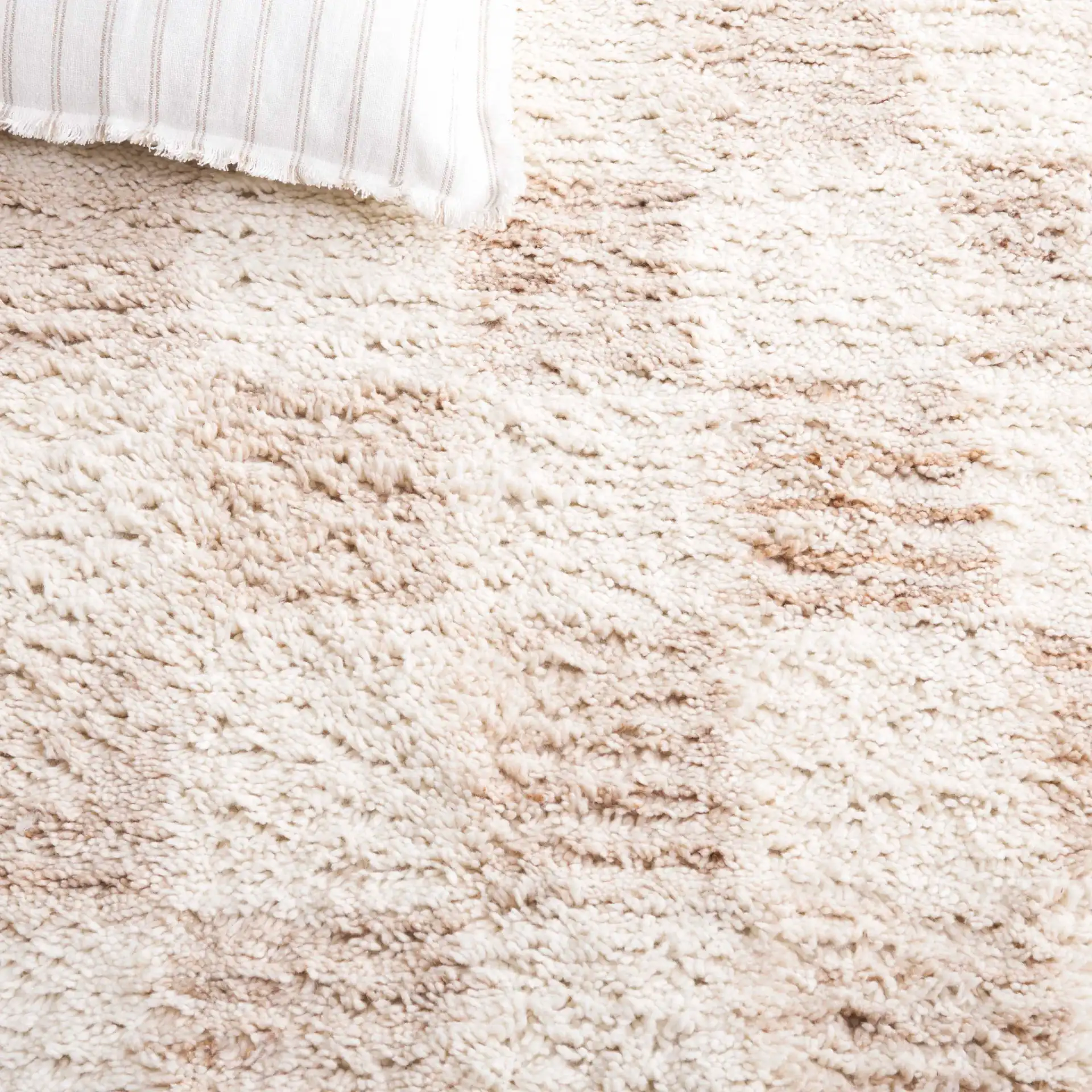 Vermont Checkerboard Hand-Tufted Wool Rug in Beige / Ivory in a styled room