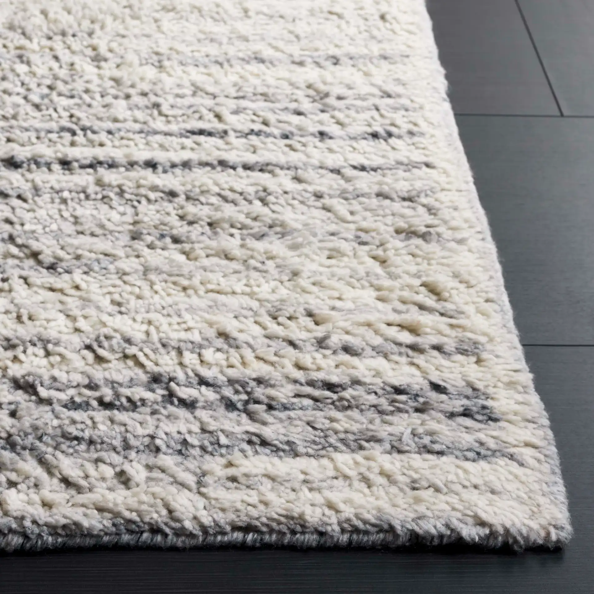 Vermont Abstract Path Wool Rug in Ivory / Gray in a styled room
