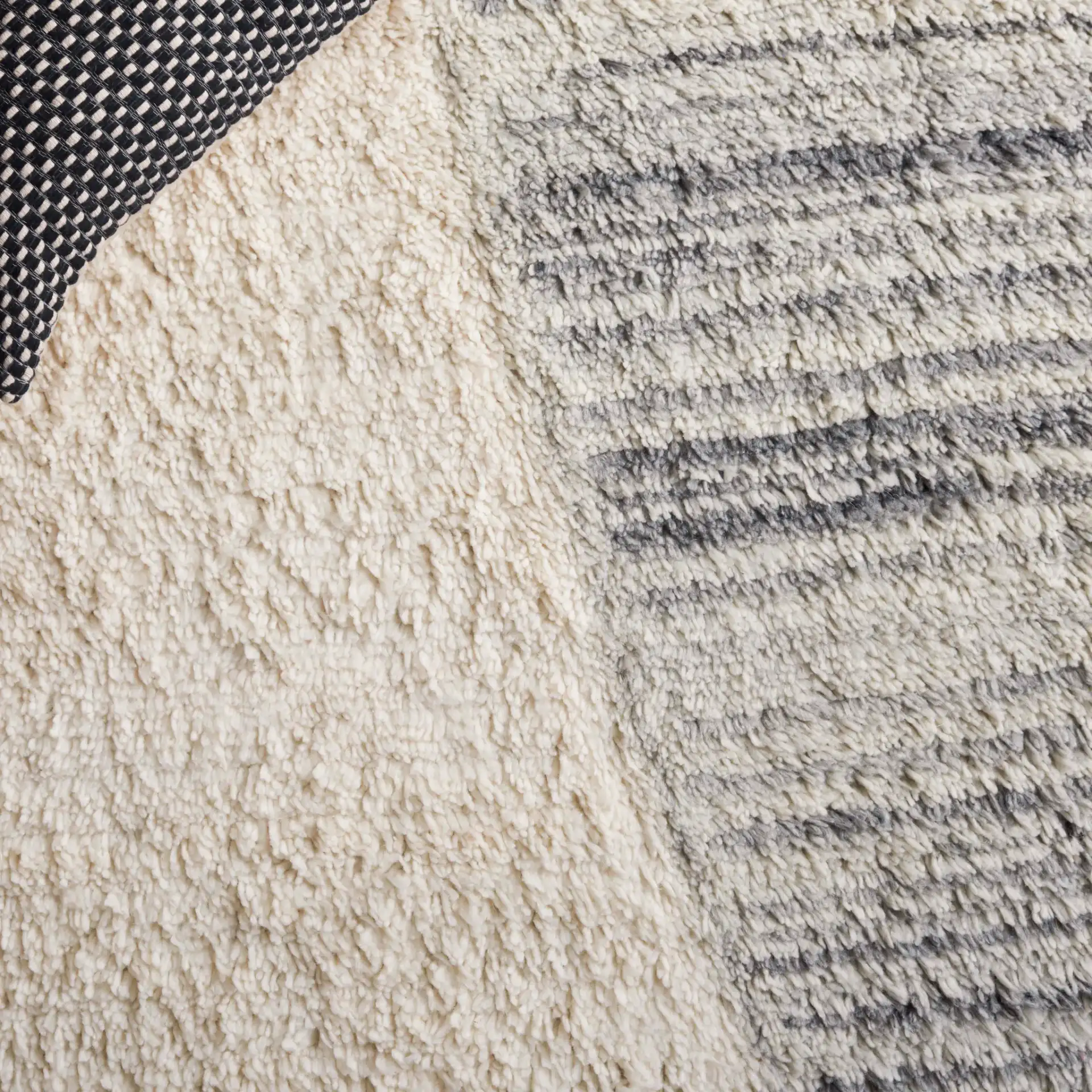 Vermont Abstract Path Wool Rug in Ivory / Gray in a styled room