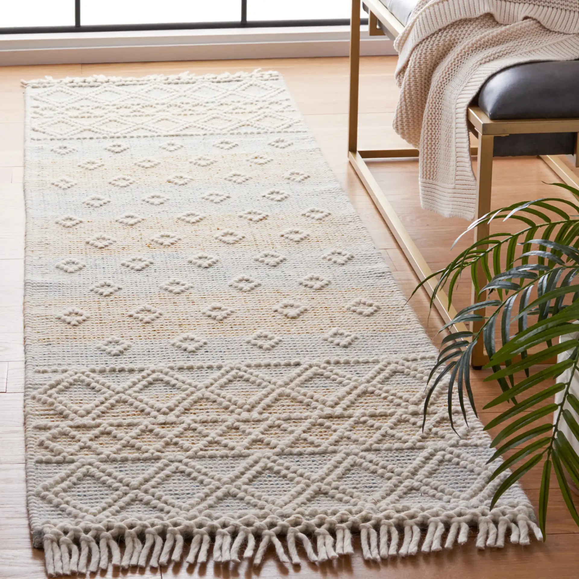 Vermont Fjord Diamond Hand-Loomed Wool Rug in Light Blue / Yellow in a styled room
