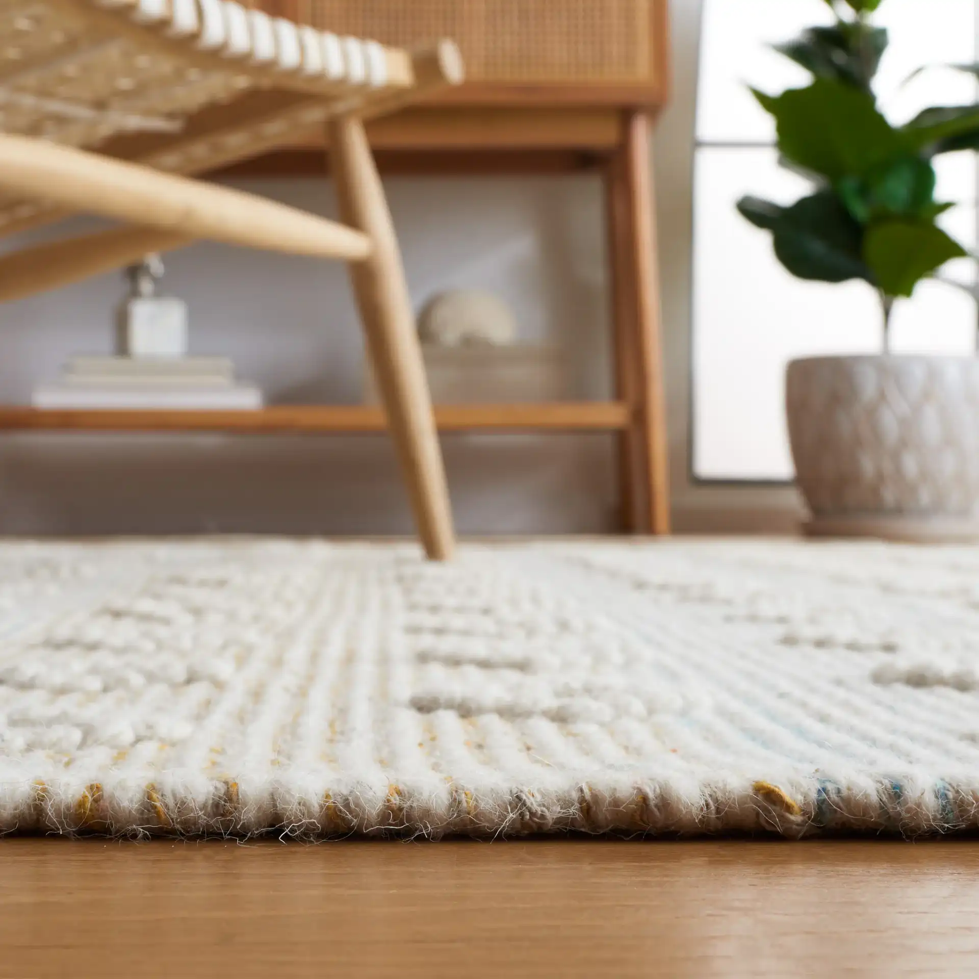 Vermont Fjord Diamond Hand-Loomed Wool Rug in Light Blue / Yellow in a styled room