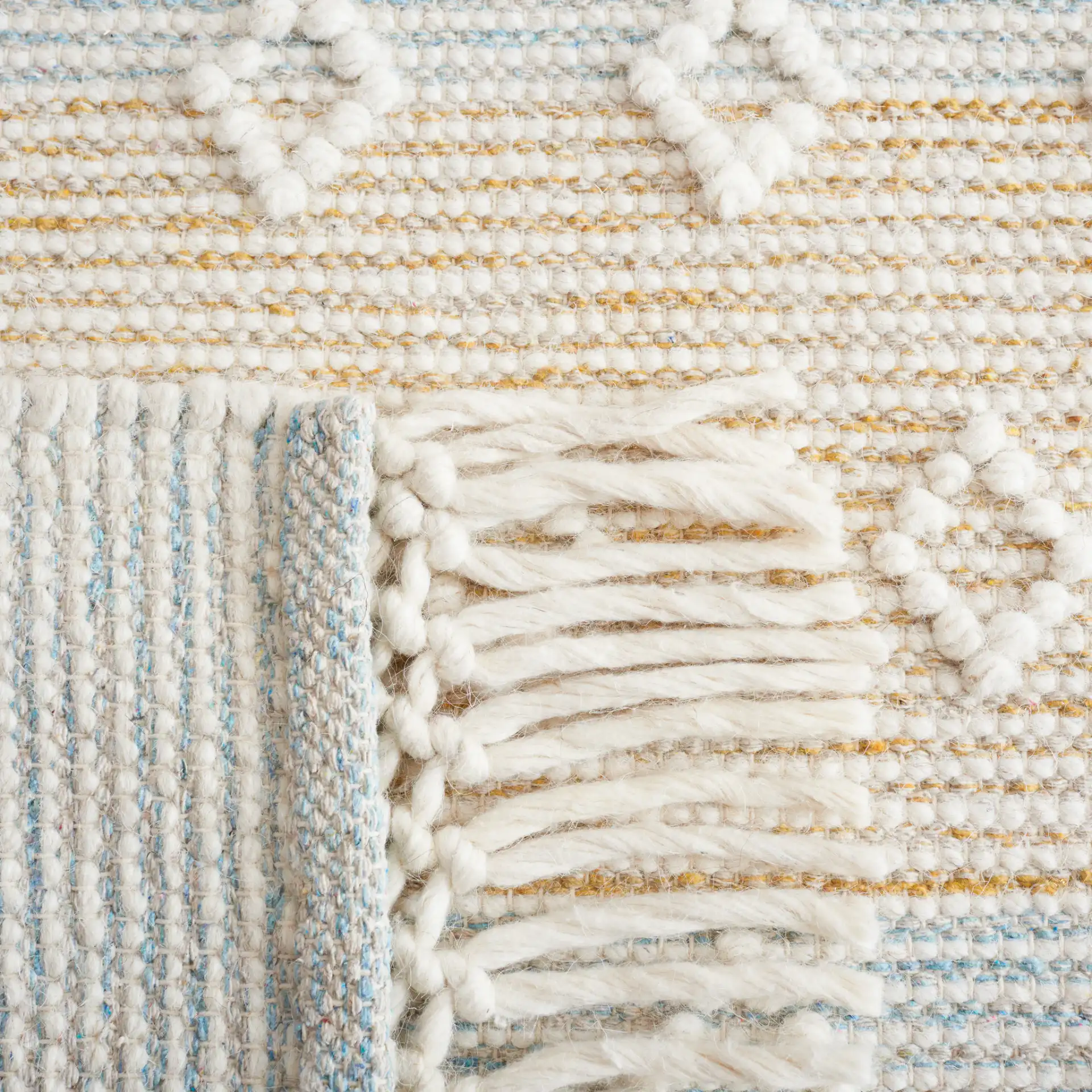 Vermont Fjord Diamond Hand-Loomed Wool Rug in Light Blue / Yellow in a styled room
