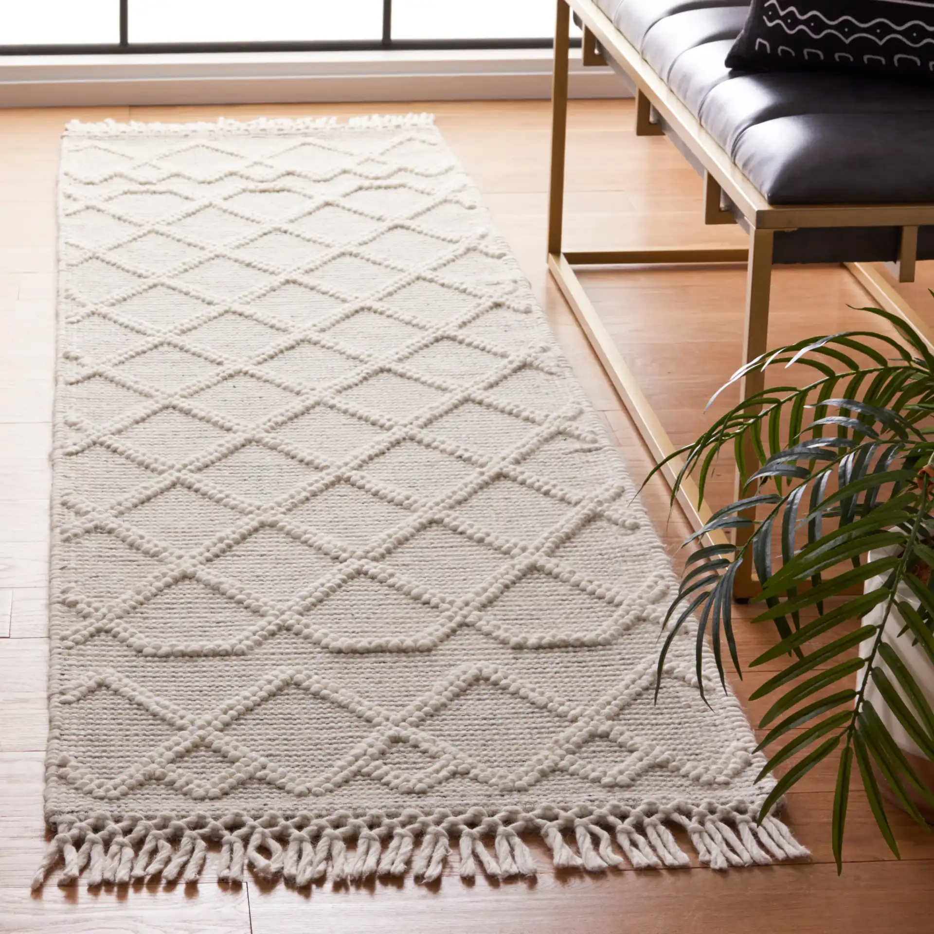 Vermont Banded Diamond Lattice Hand-Loomed Wool Rug in Black / Ivory in a styled room