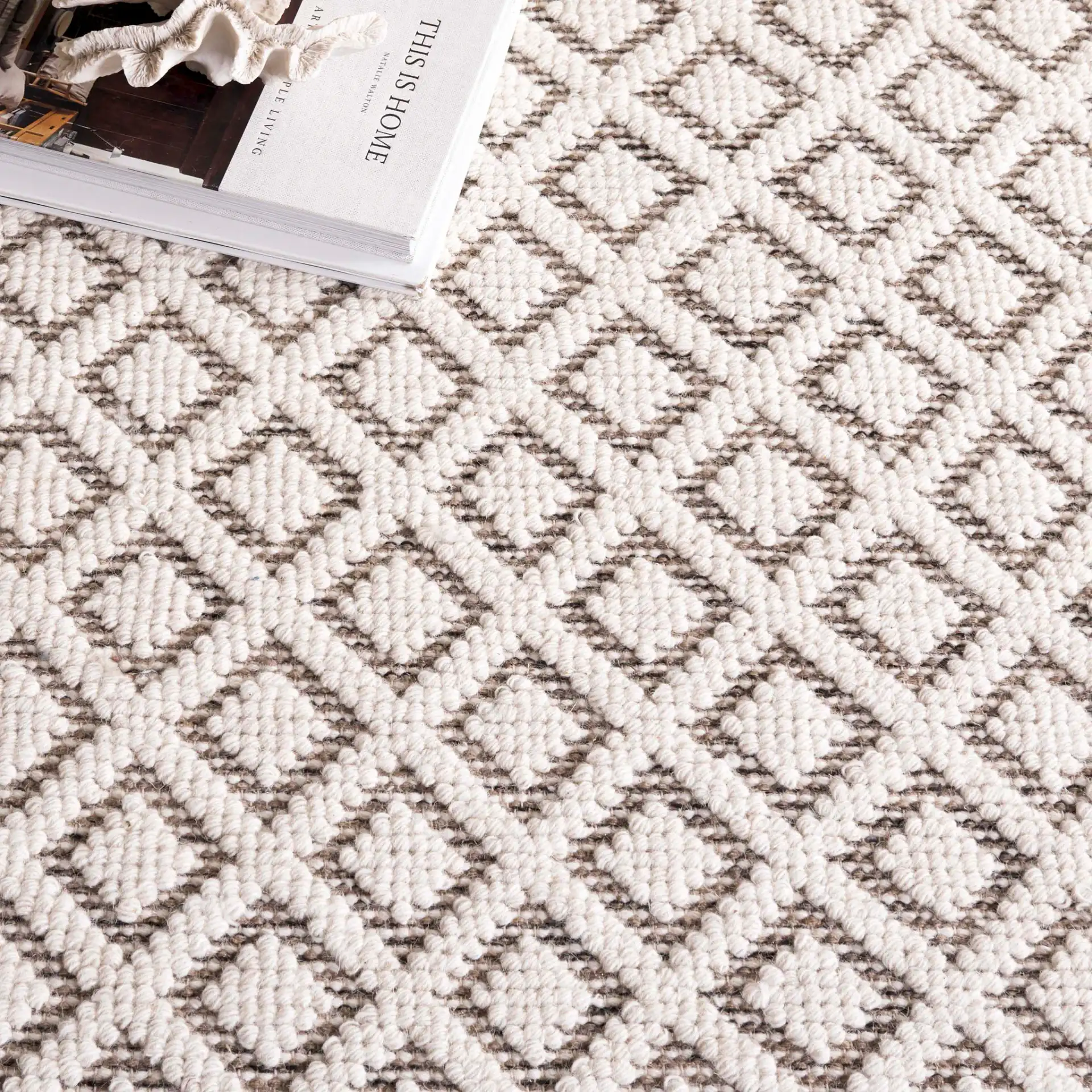 Vermont Diamond Lattice Hand-Woven Wool Rug in Ivory / Brown in a styled room