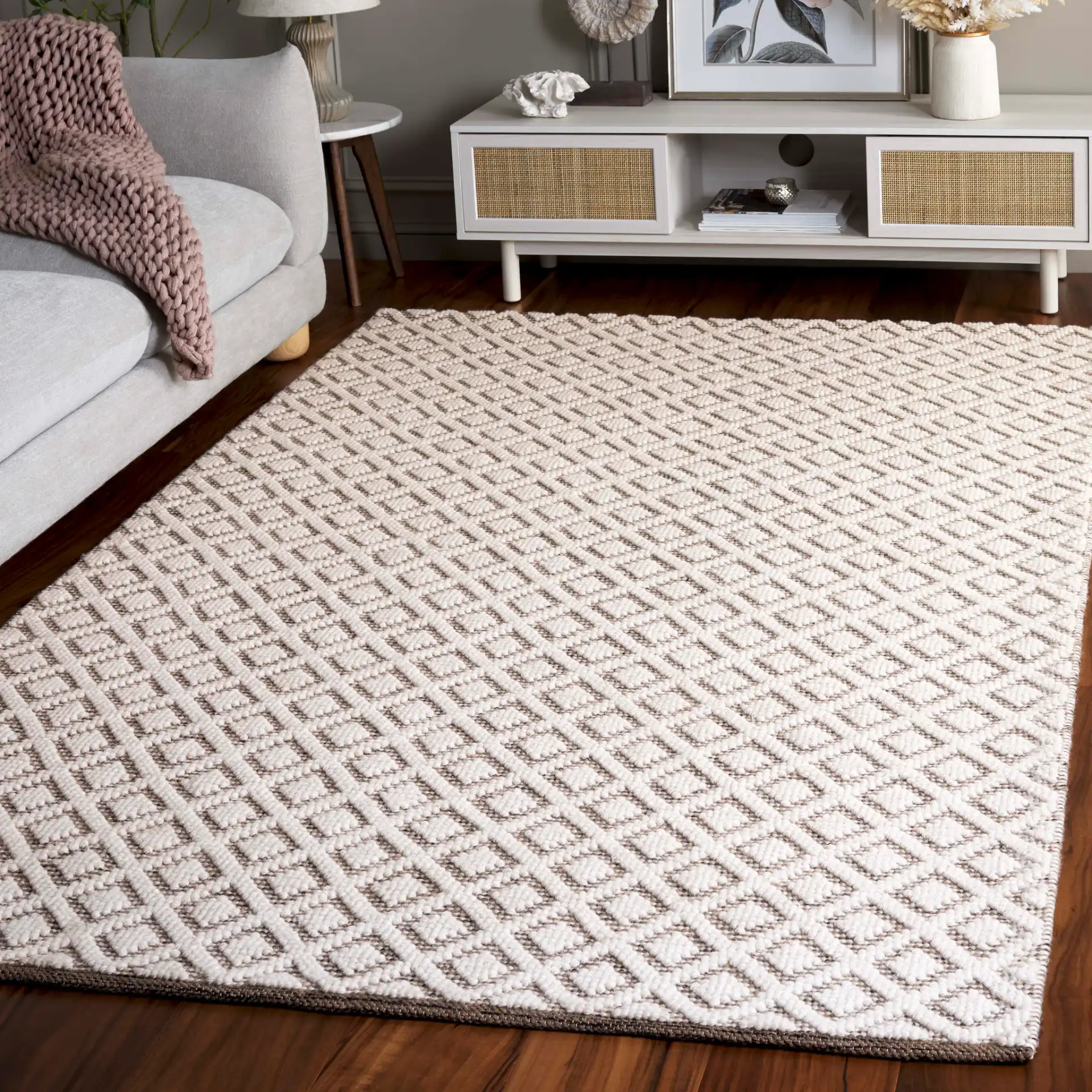 Vermont Diamond Lattice Hand-Woven Wool Rug in Ivory / Brown in a styled room